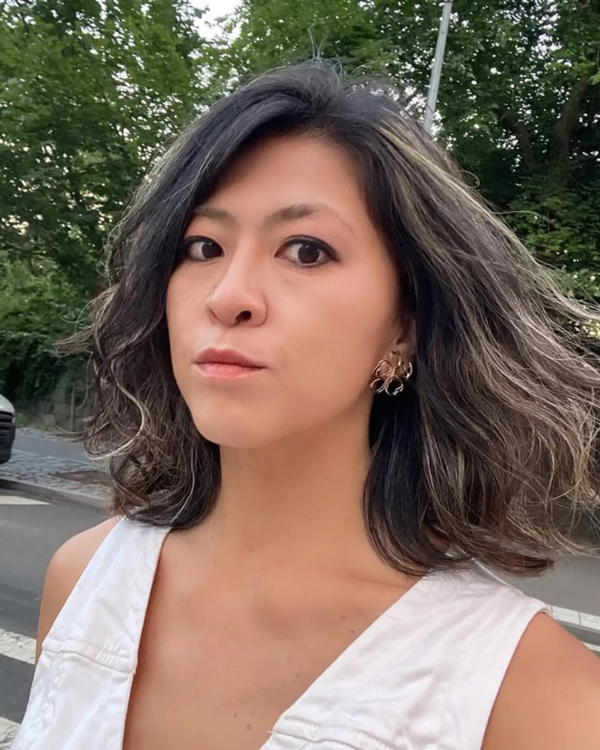 A medium-length wavy bob with a bronde balayage. 1