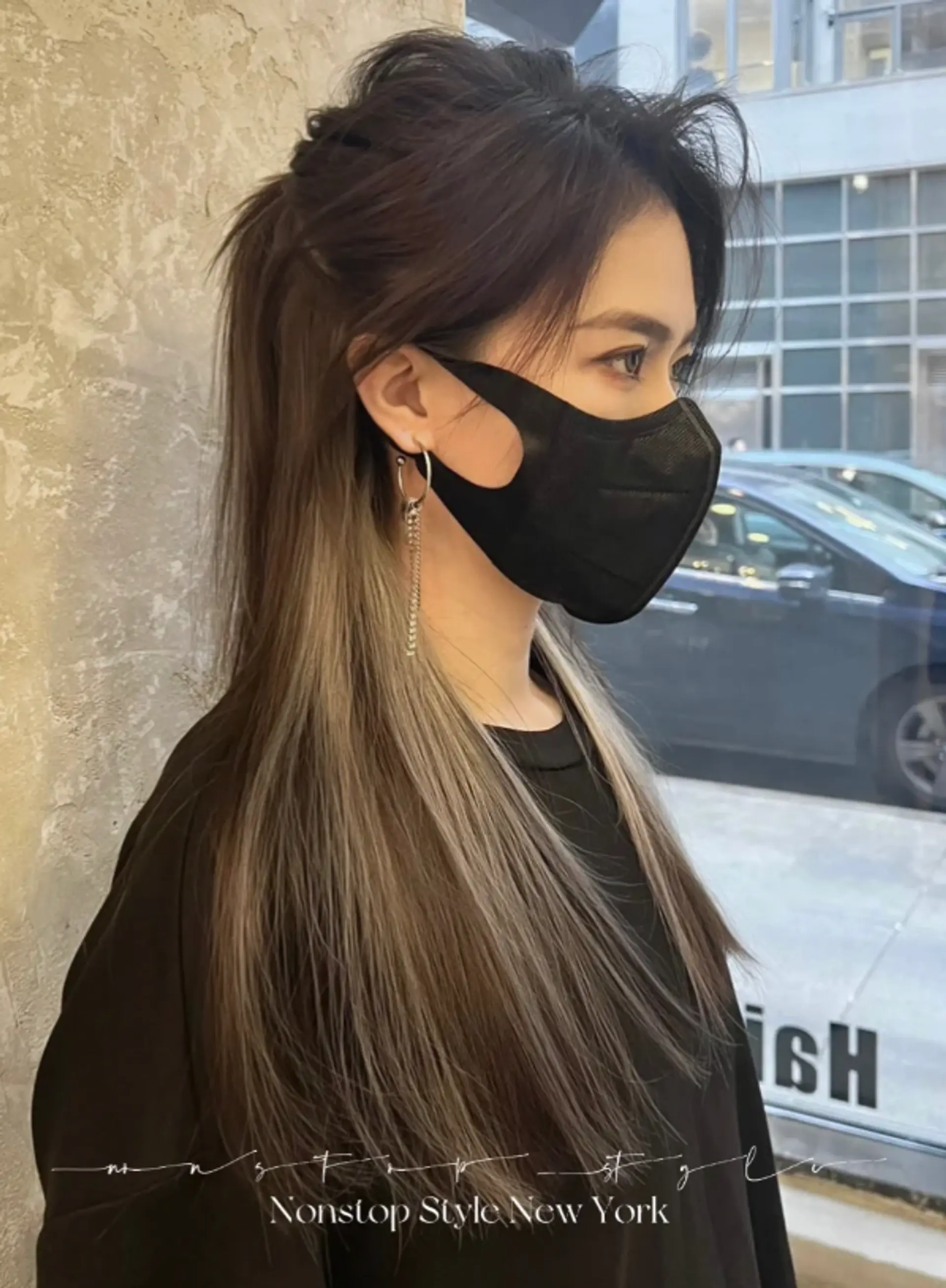 A long, straight hairstyle with layered precision, featuring a voluminous crown and an elegant gray ombre transitioning from black roots. The hair cascades smoothly with a slightly tousled finish, giving it a chic, street-style vibe.
(NonstopStyle: by Ben) 1