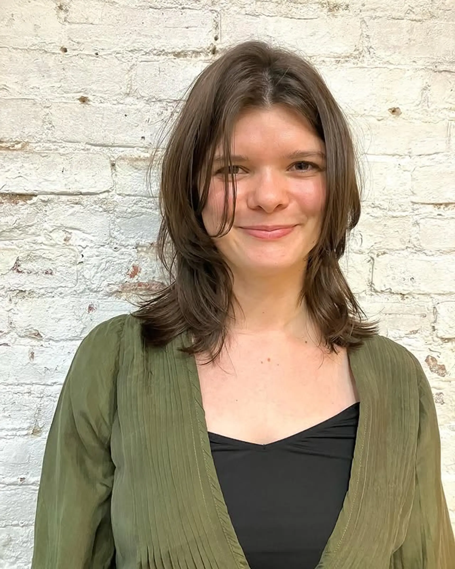 A trendy mid-length shag with choppy, face-framing layers and wispy ends for a relaxed, textured style. 1