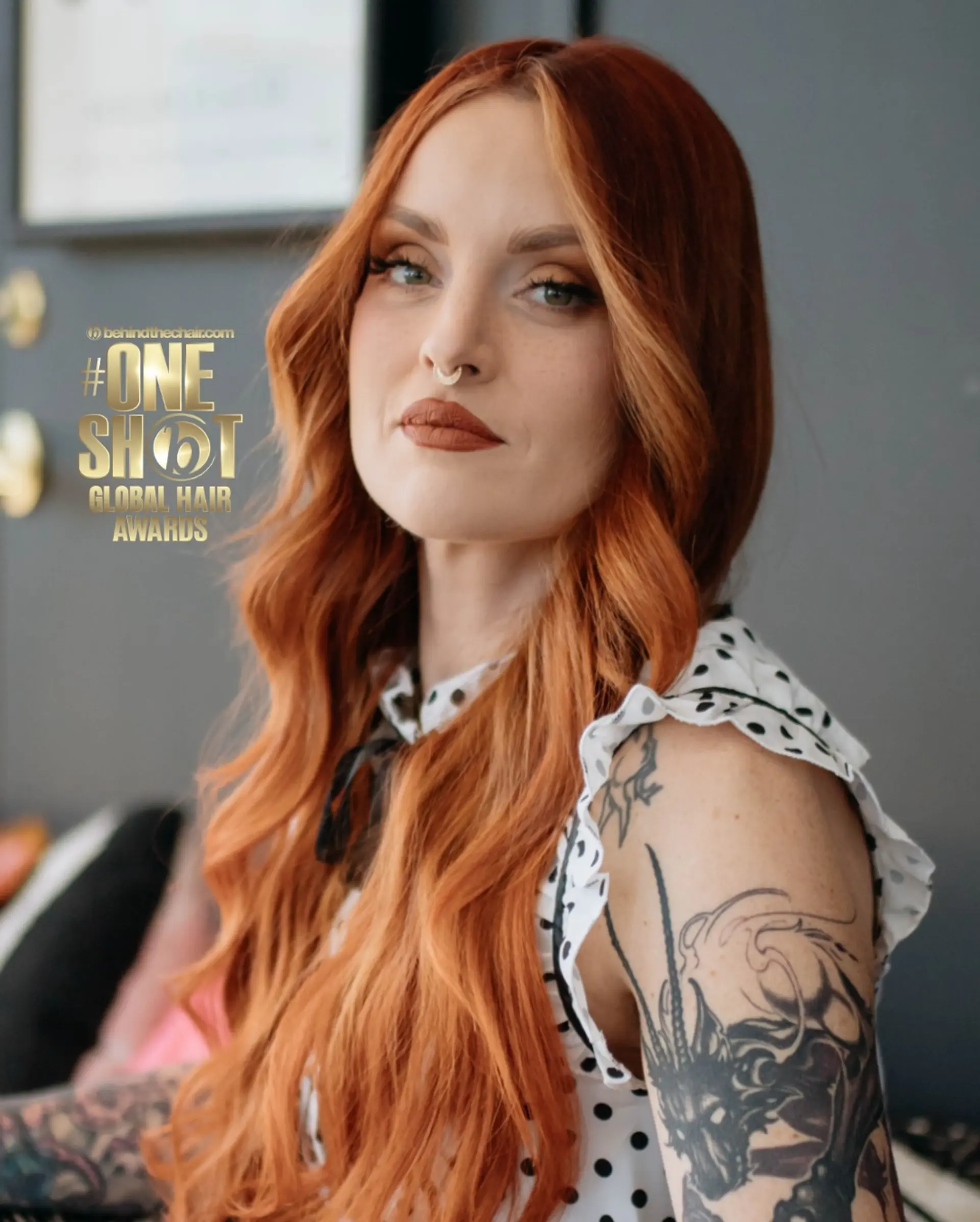 Long, rich copper hair styled into soft, dimensional waves with a middle part. 1