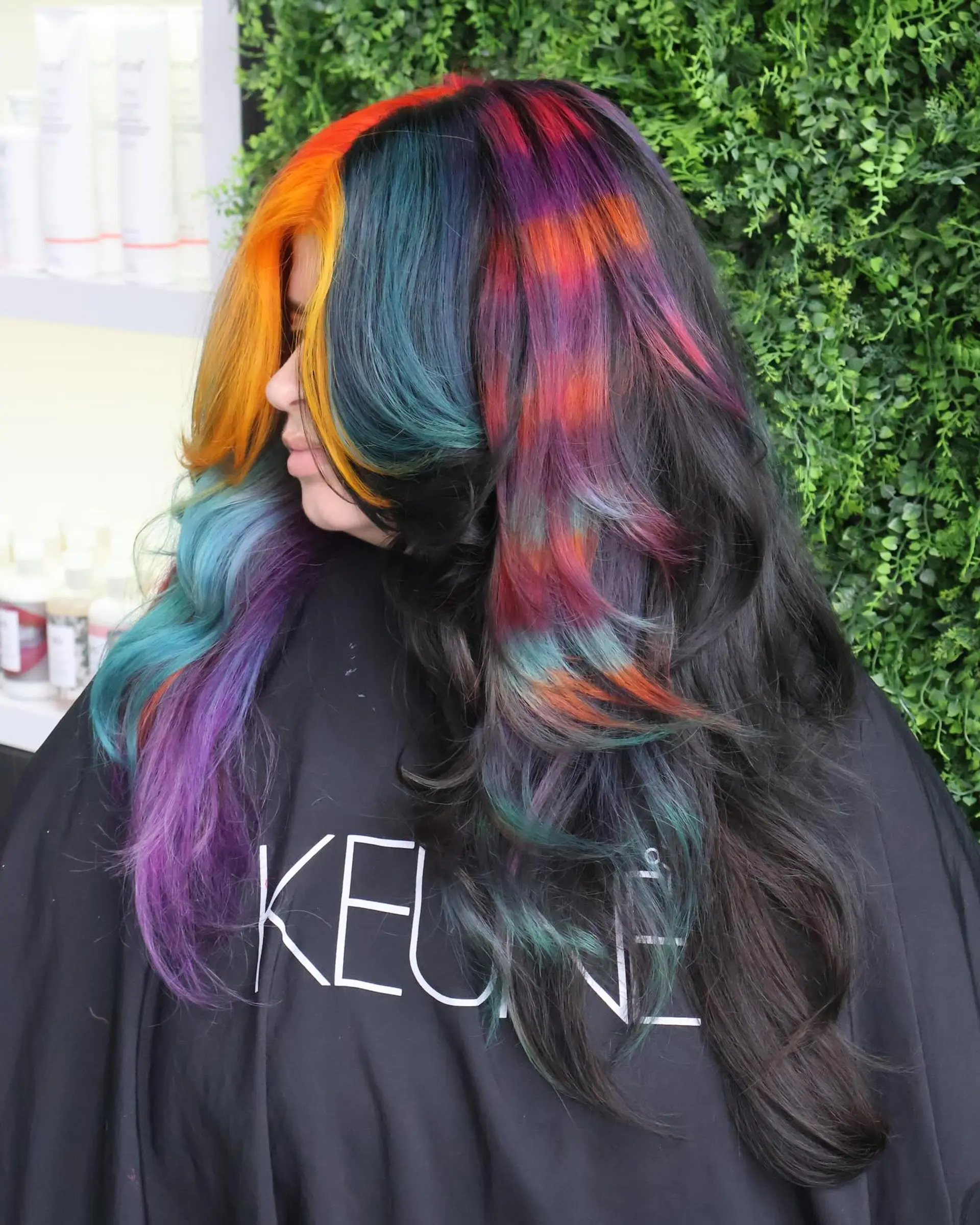 A long, wavy hairstyle with a rainbow balayage effect. 5