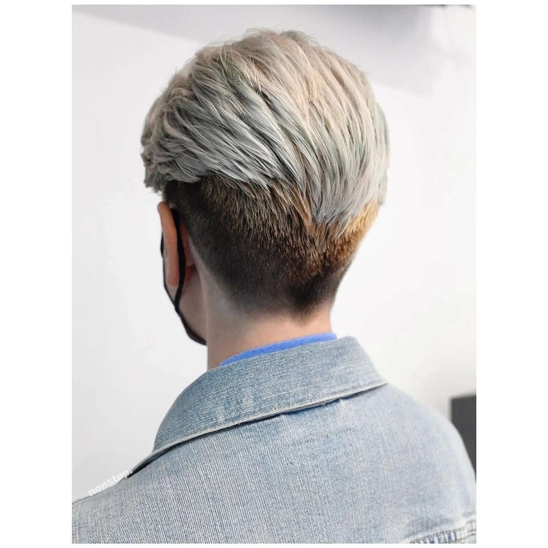 An expertly executed undercut with a precise fade, featuring a longer top in platinum blonde that contrasts with ash brown lower sections. Straight and structured for a modern, edgy look. 🦏Hair by DYNO 🦏 1