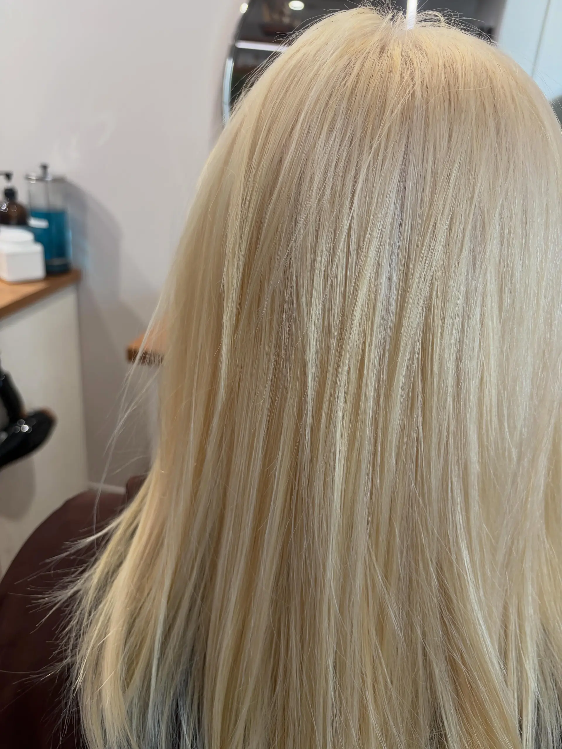 Long straight platinum blonde hair. 1