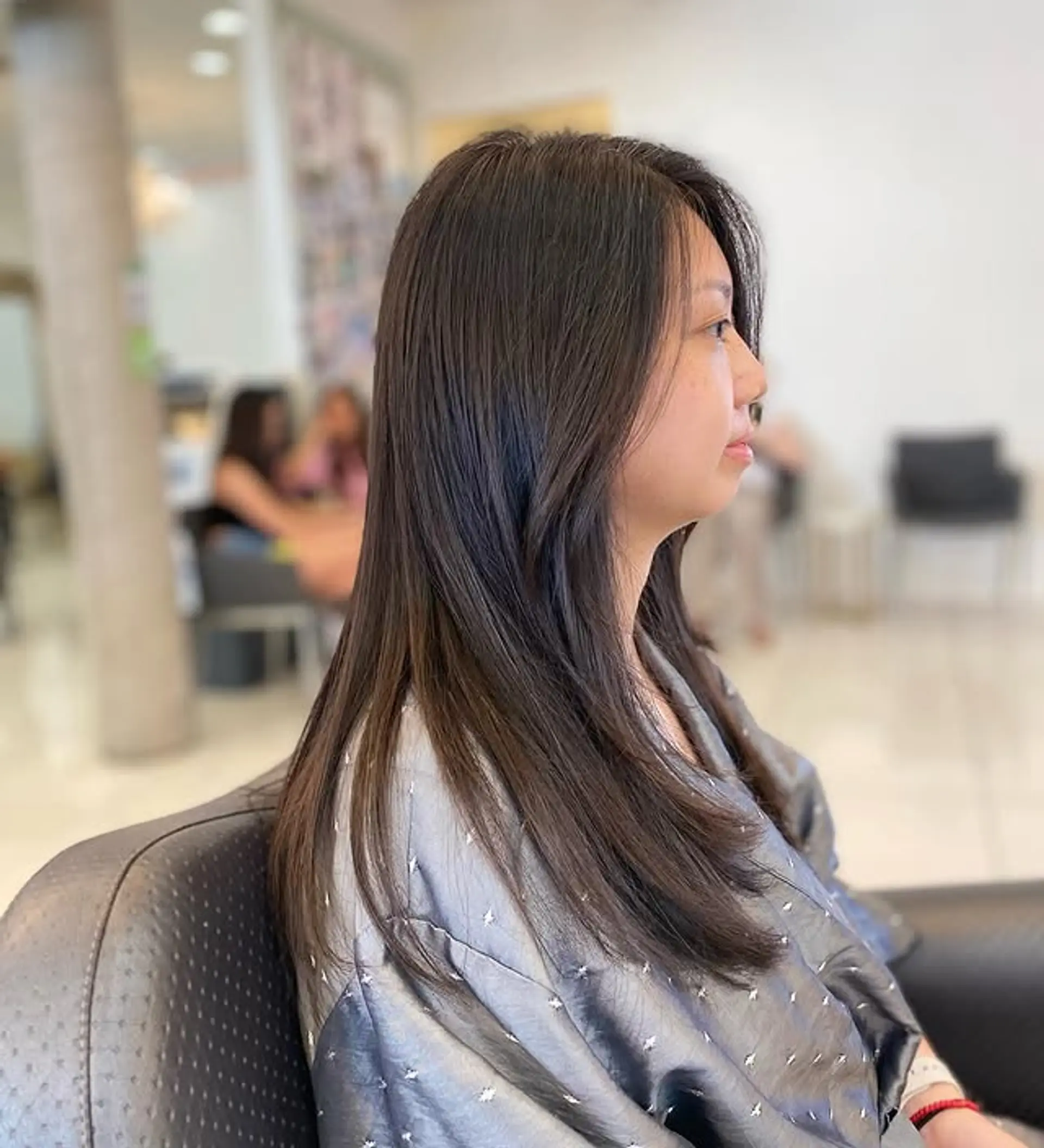 A layered long bob with a silky finish. 1