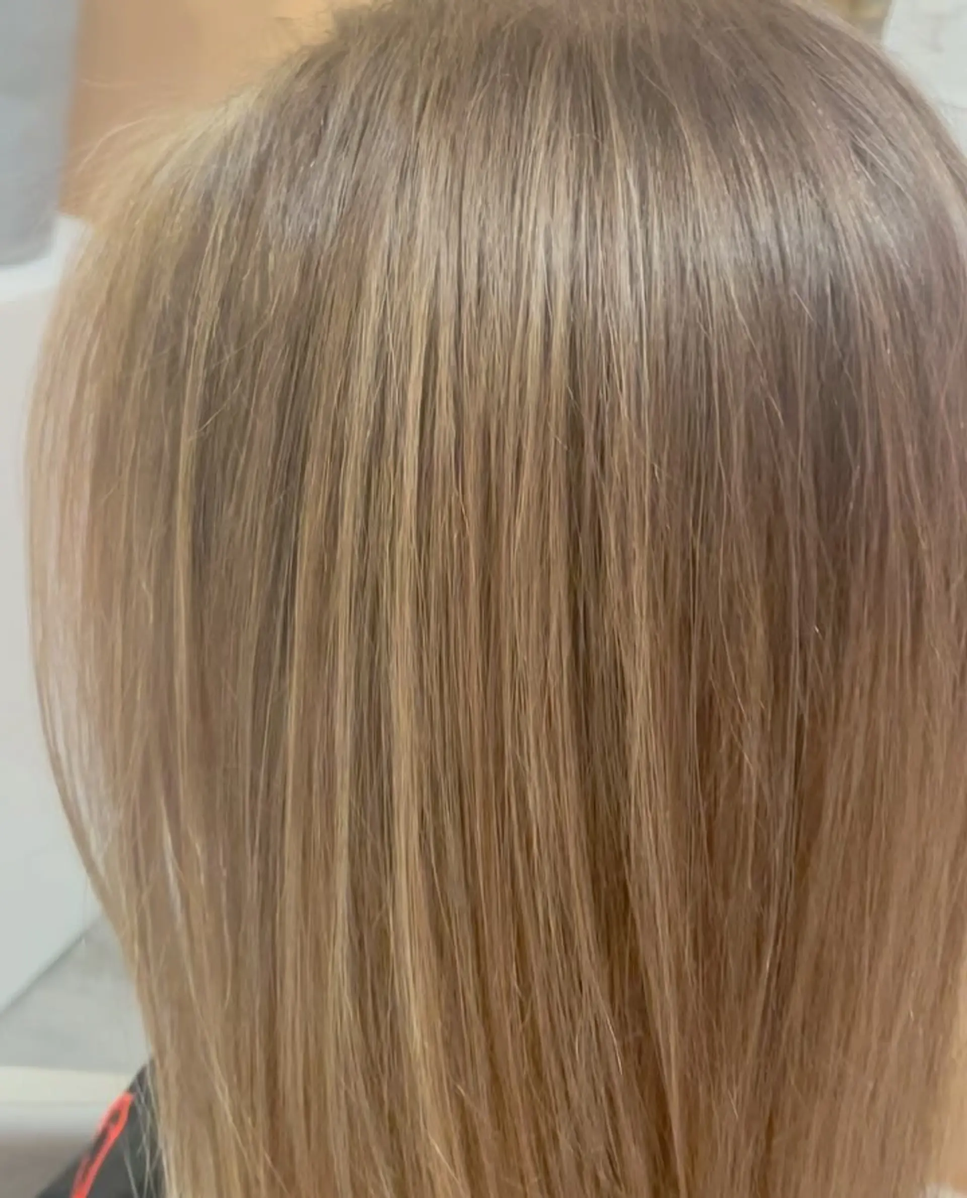Straight medium-length hair with ultra-fine, seamless honey blonde babylights over a natural light brown base. 1