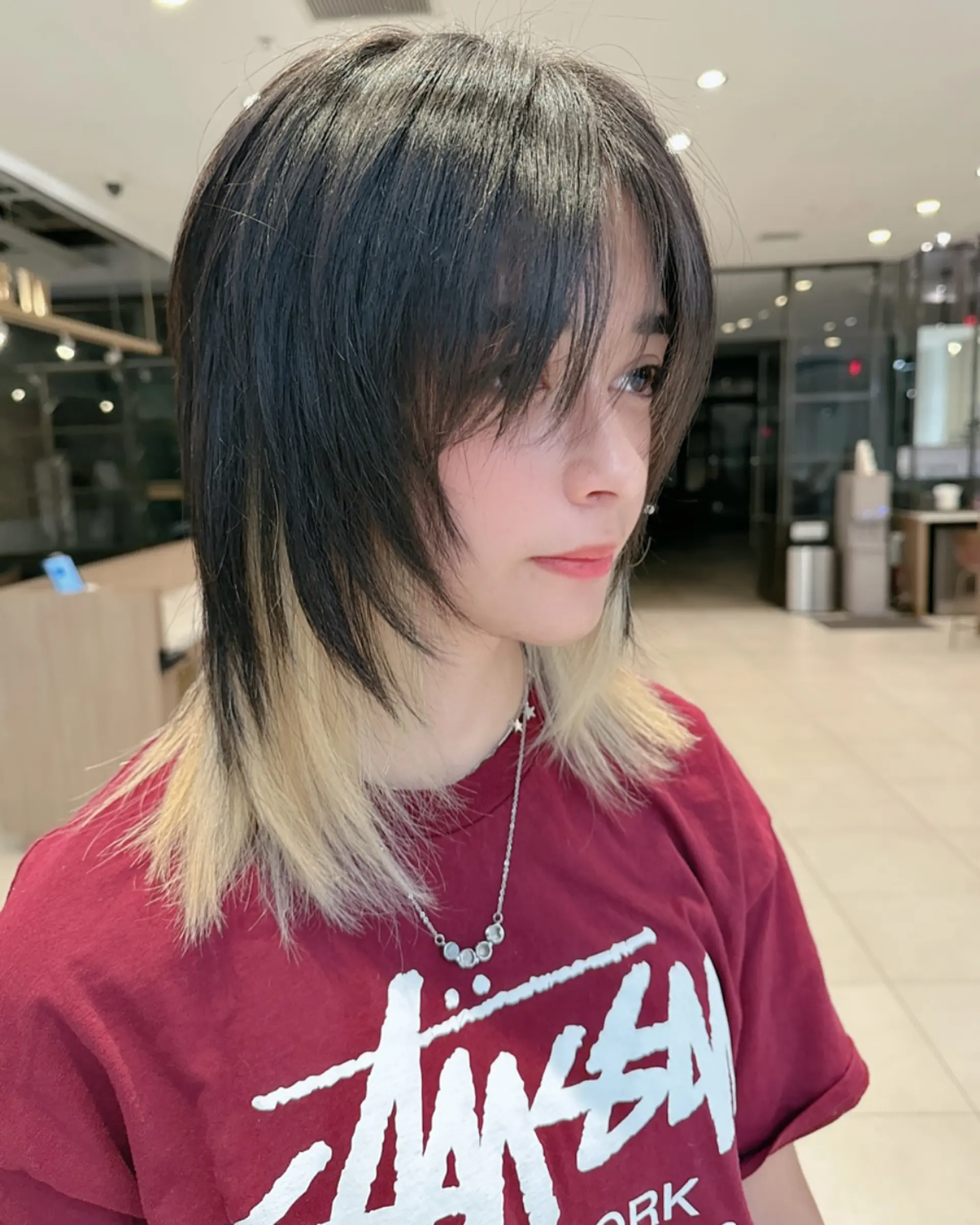 A modern shaggy mullet with face-framing bangs and edgy layering. 1