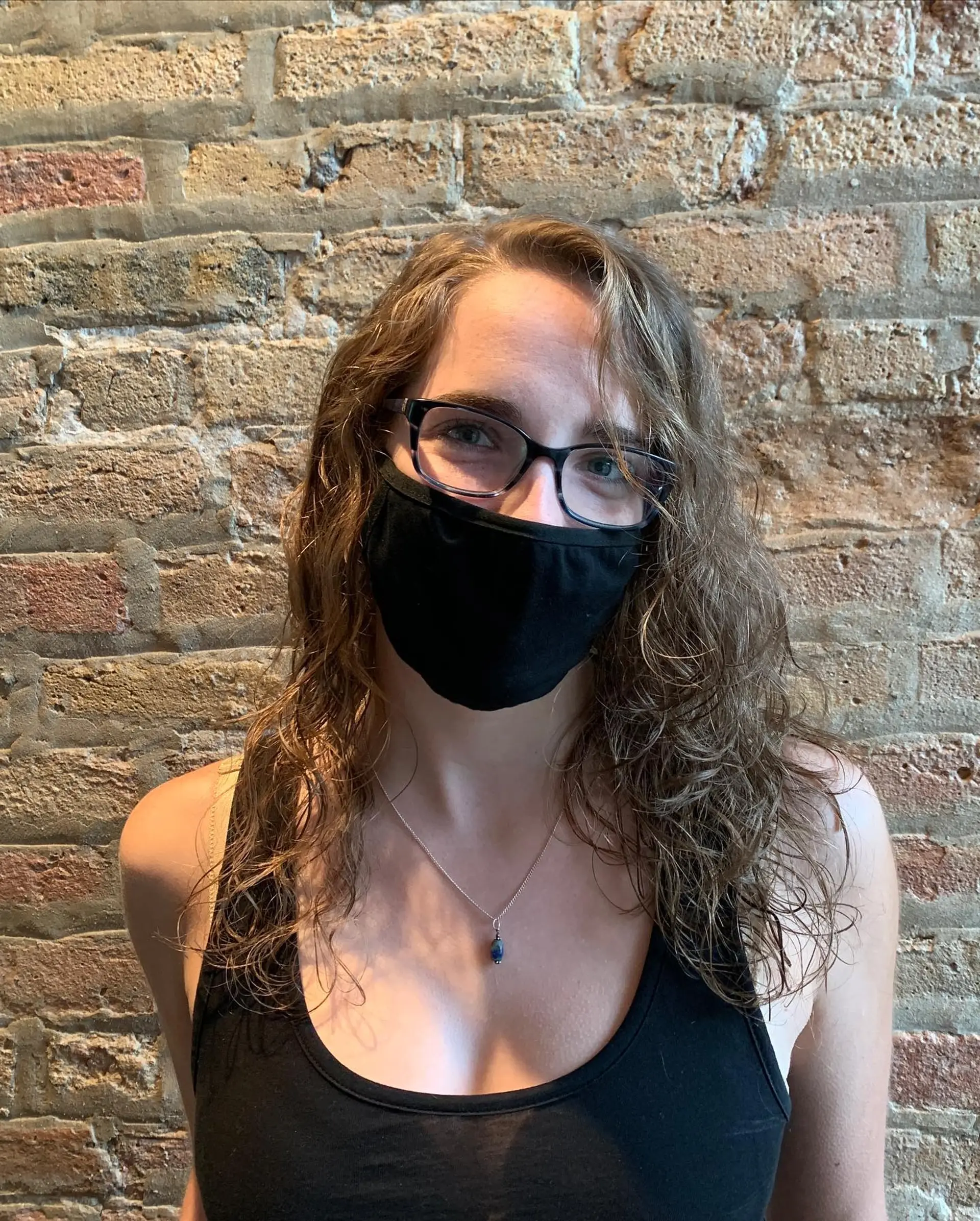 A long, layered wavy hairstyle with a natural, beachy wave texture. 2