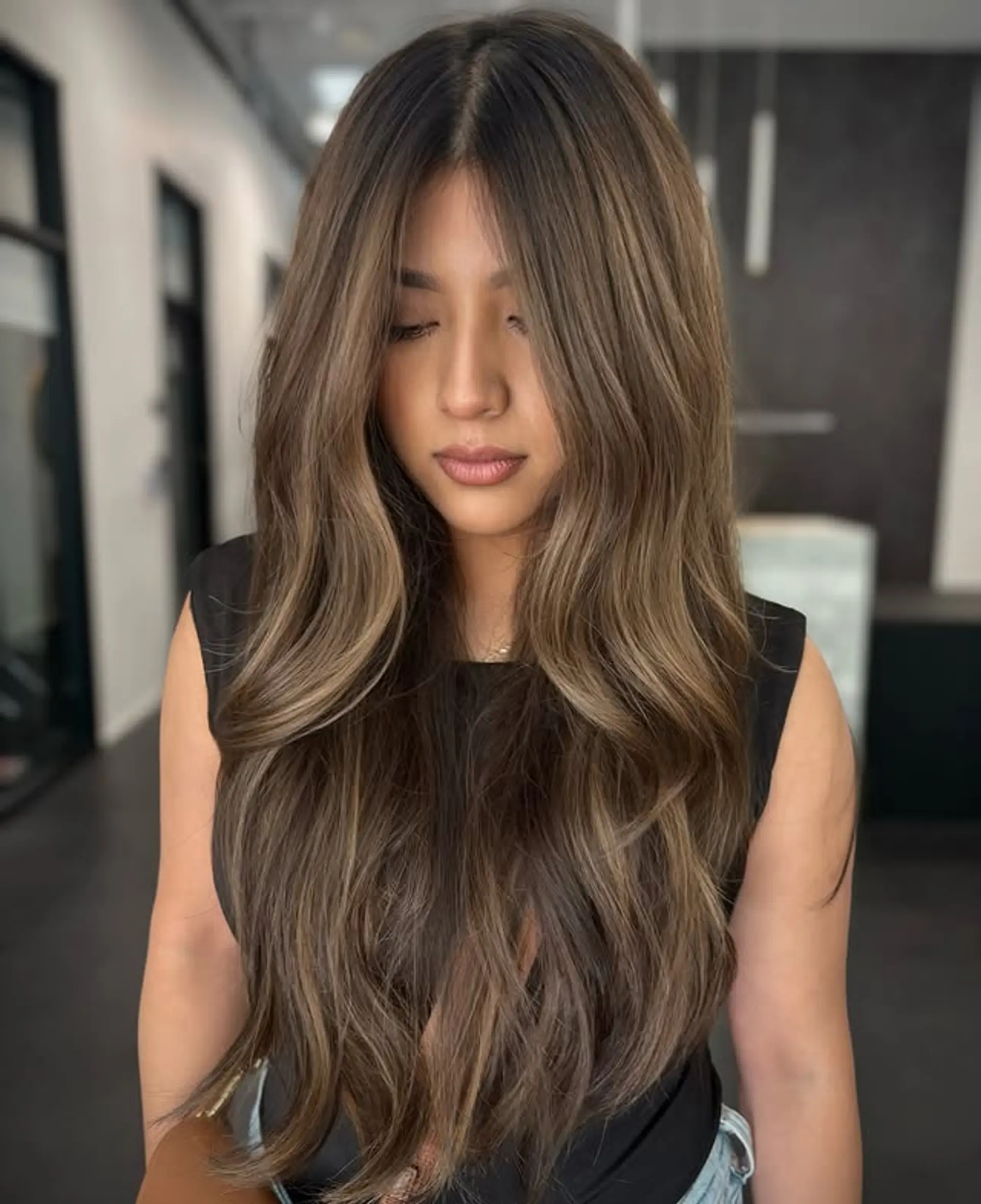 Long, wavy hair with a caramel swirl balayage. 1