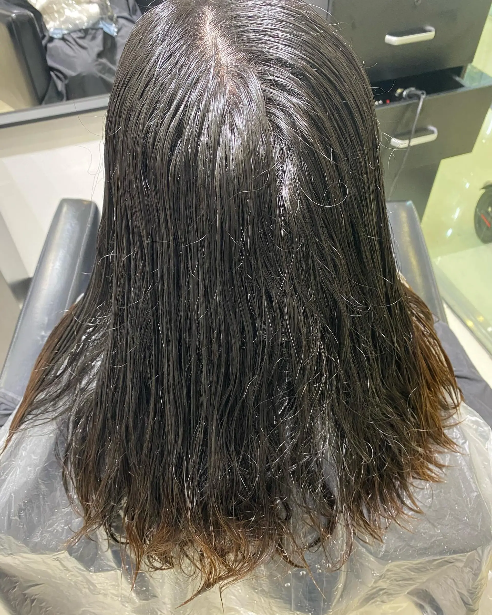 A classic balayage long layered style with a dark base and bronzed ends. 1