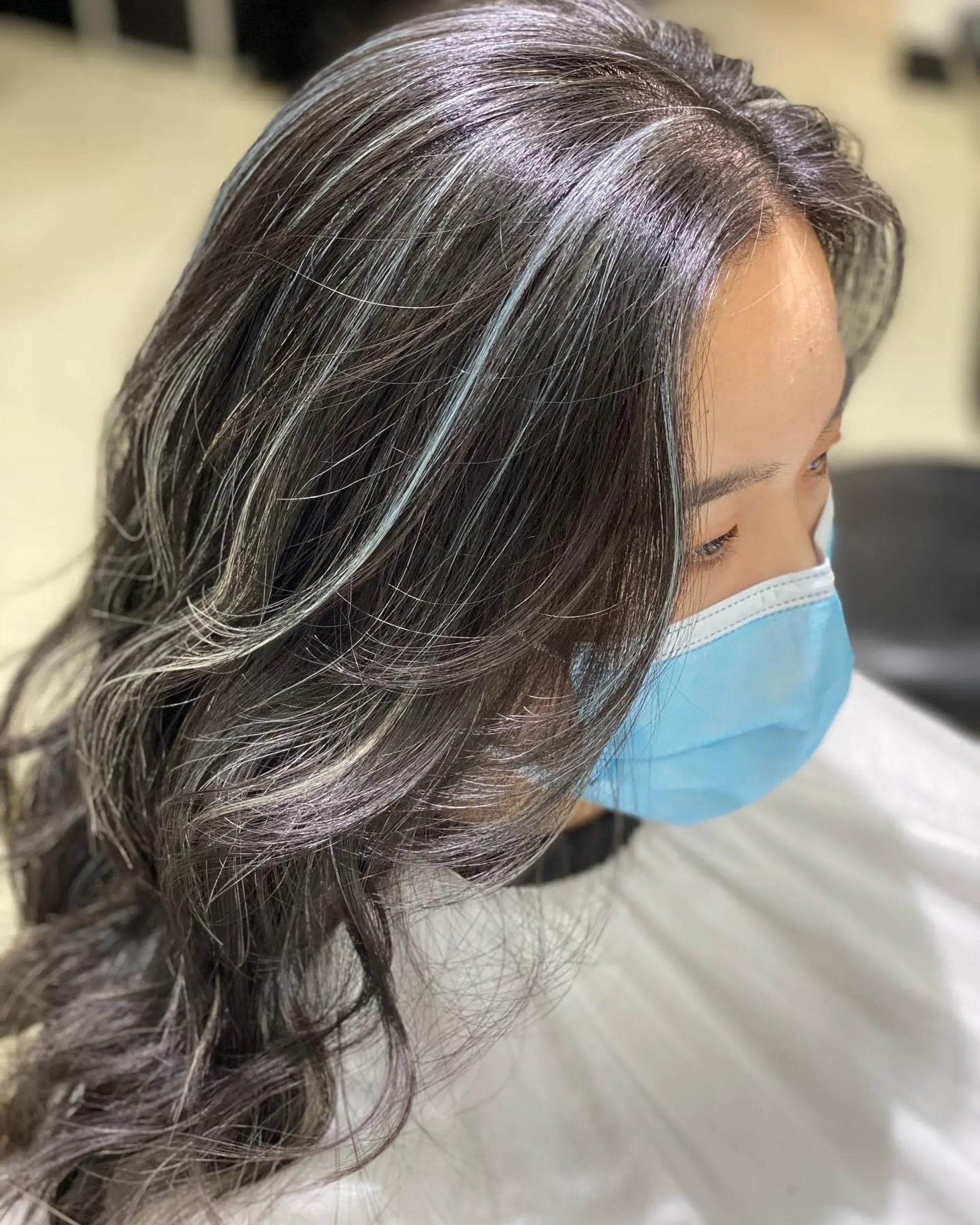 A classic balayage long layered style with a dark base and bronzed ends. 2