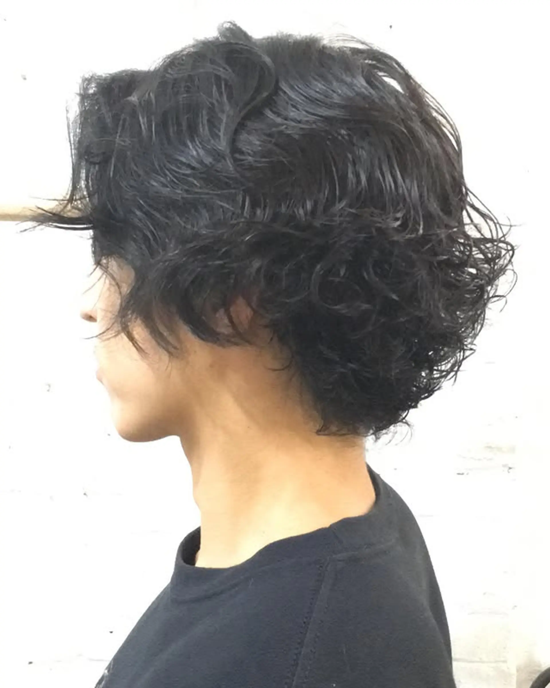 A trendy, medium-length shag with natural waves and textured layers. 1