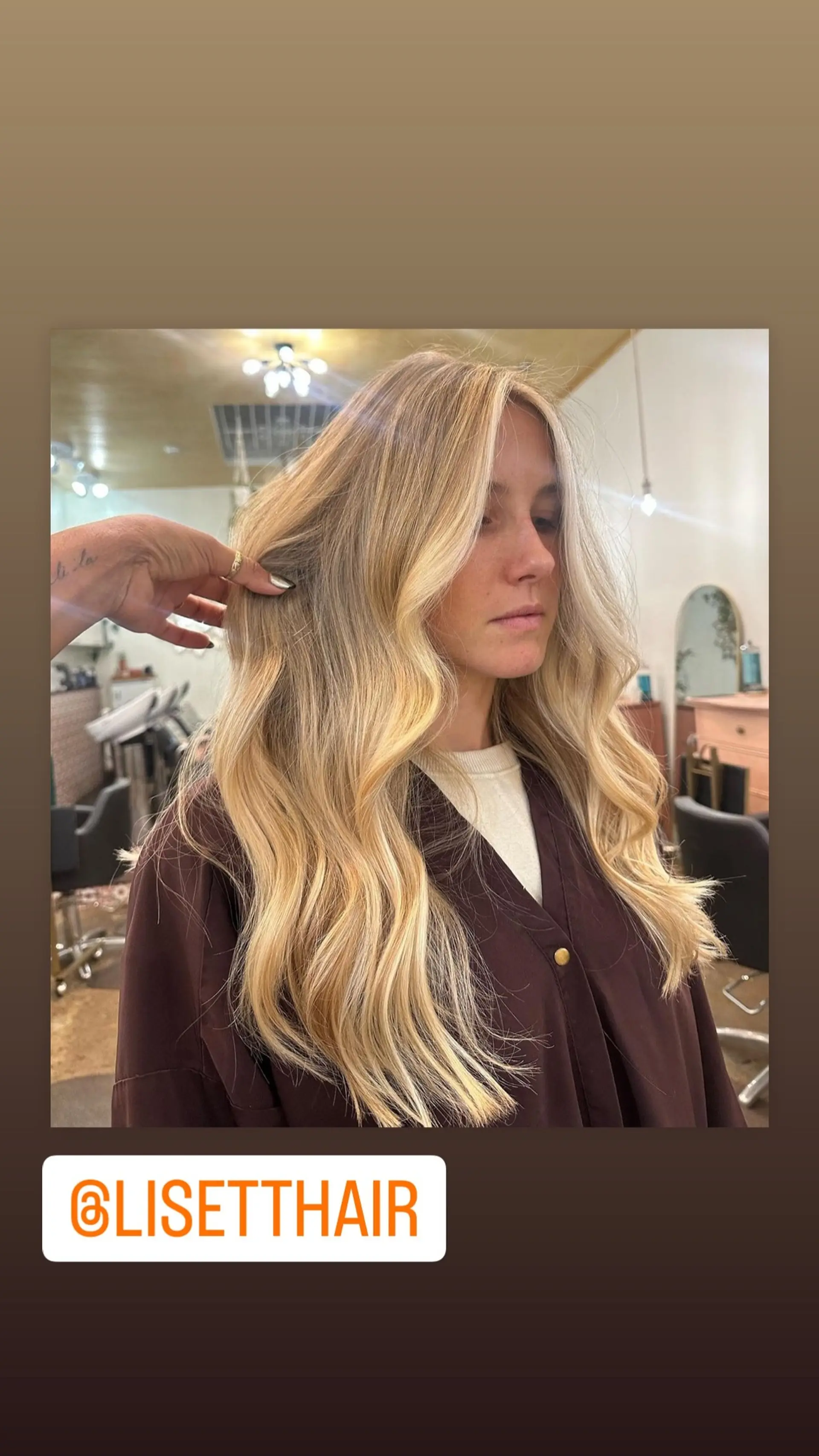 Long wavy hair with a blonde balayage and beachy waves. 1