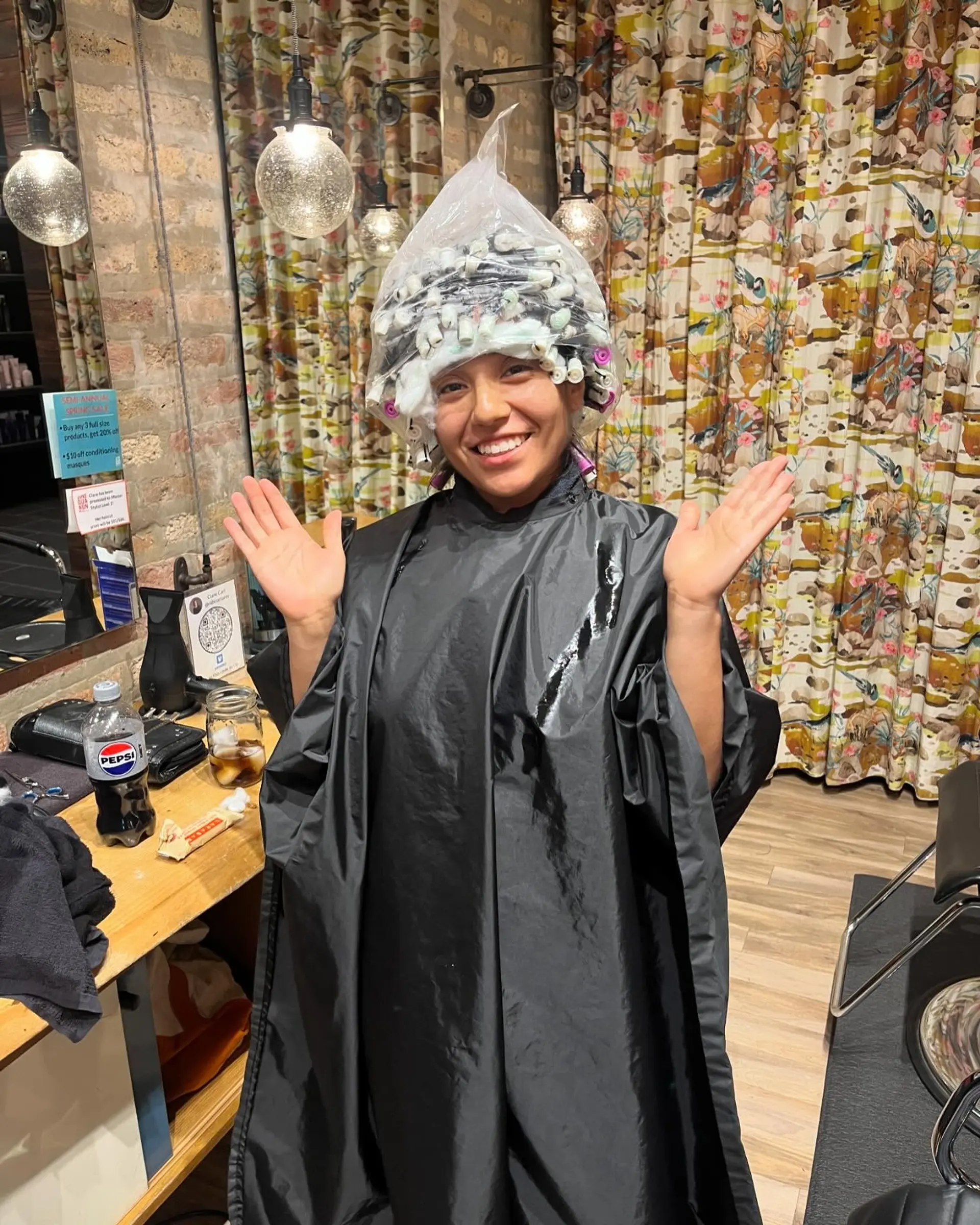 Permed hair in rollers. 3