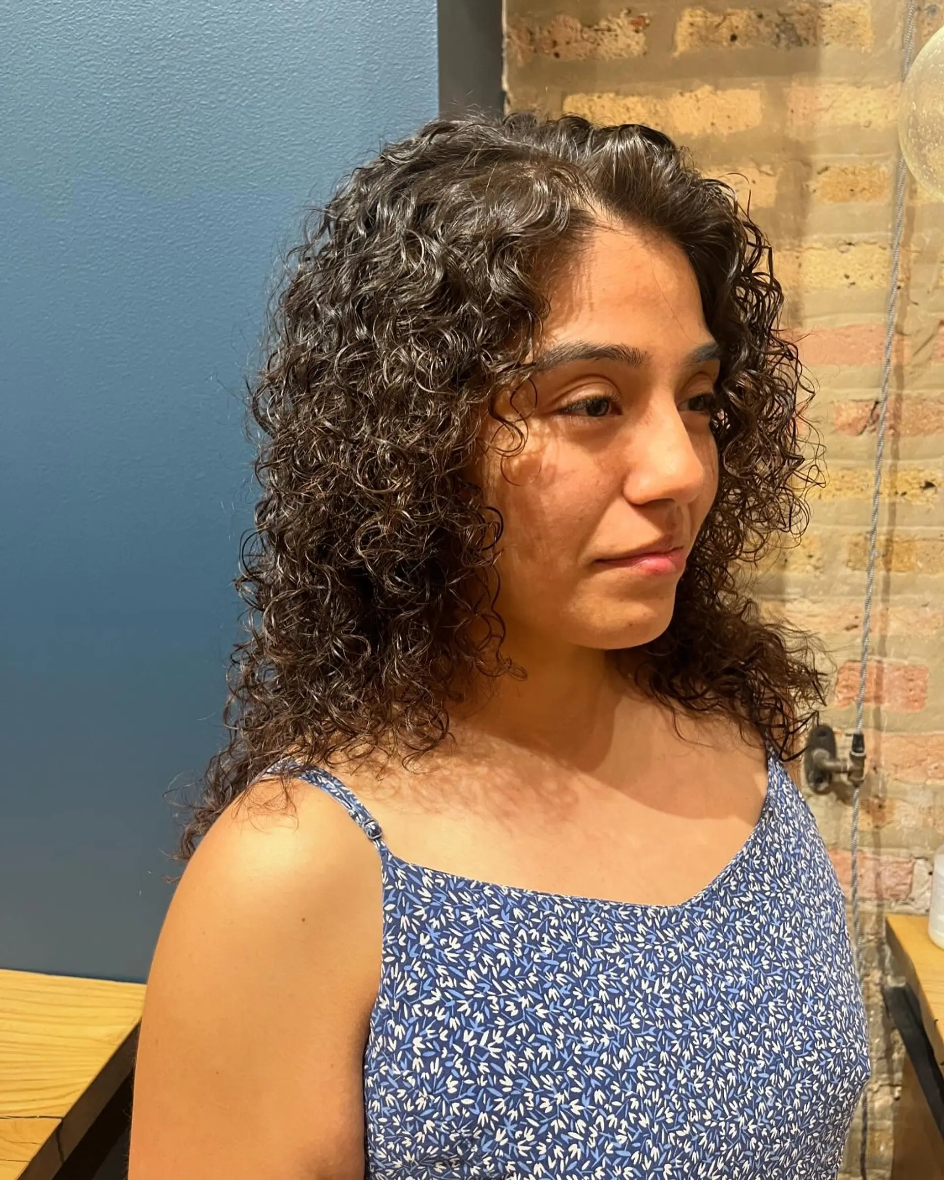 Permed hair in rollers. 1