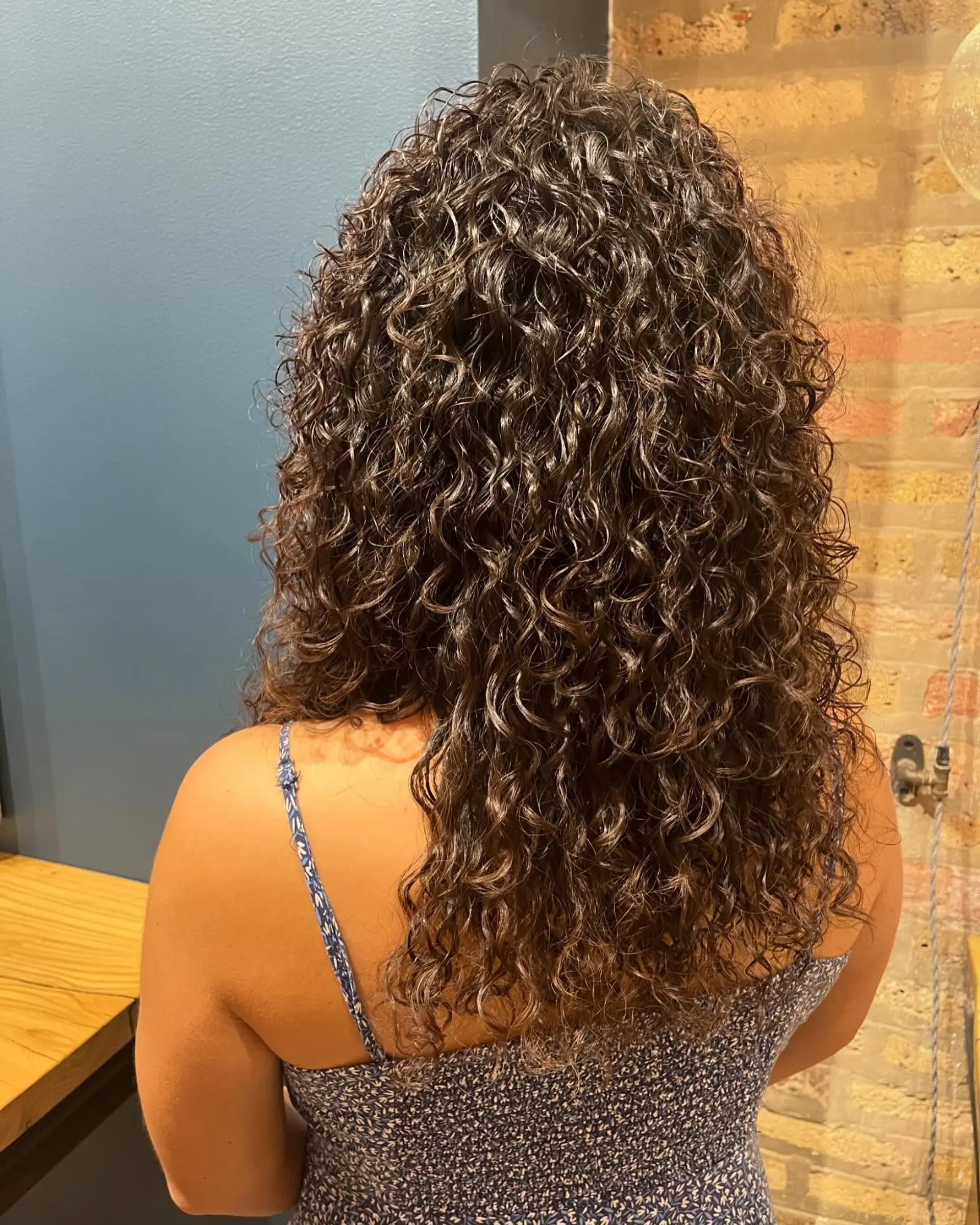 Permed hair in rollers. 2