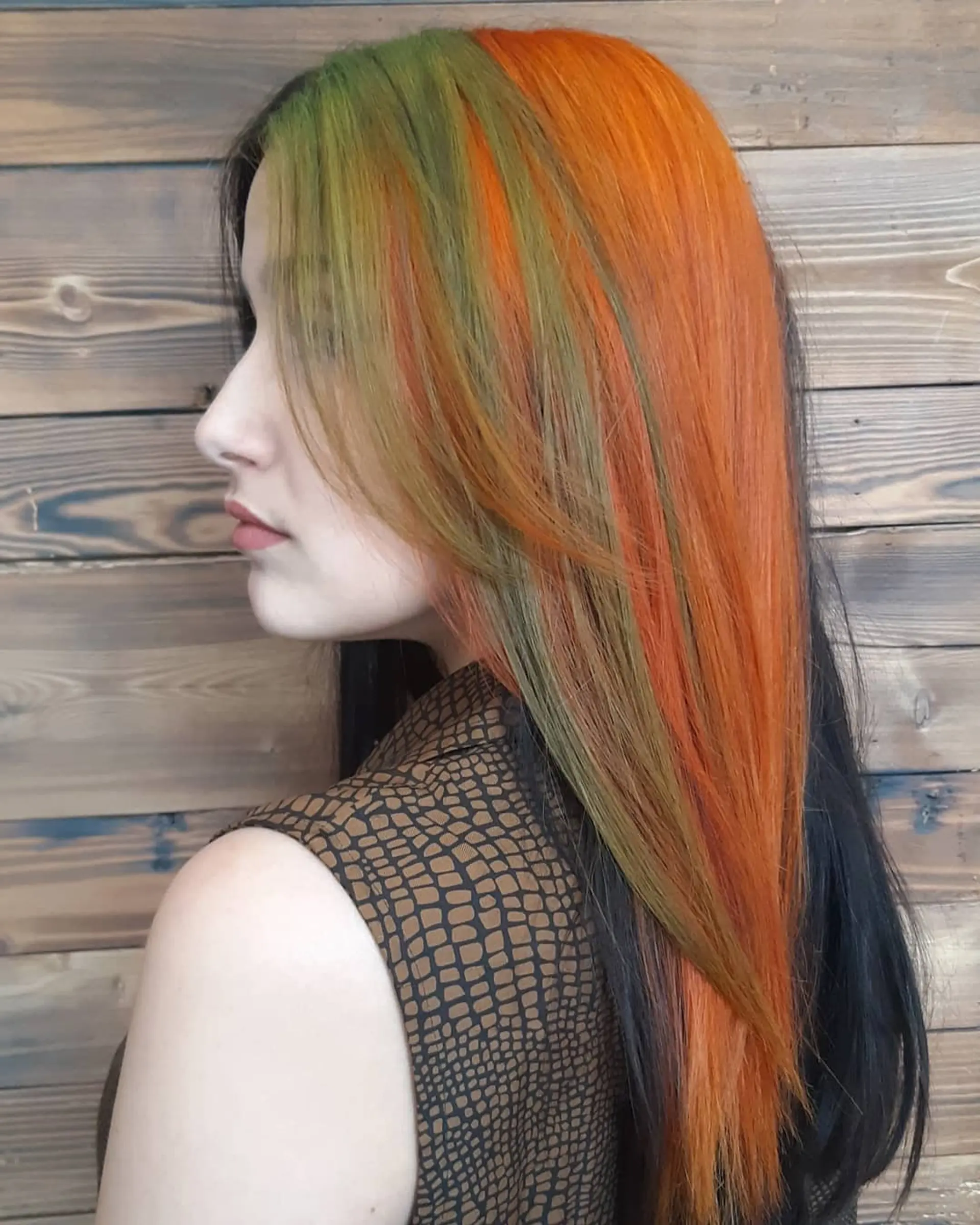 Long straight hair with distinct orange and green coloring, featuring long layers. 1