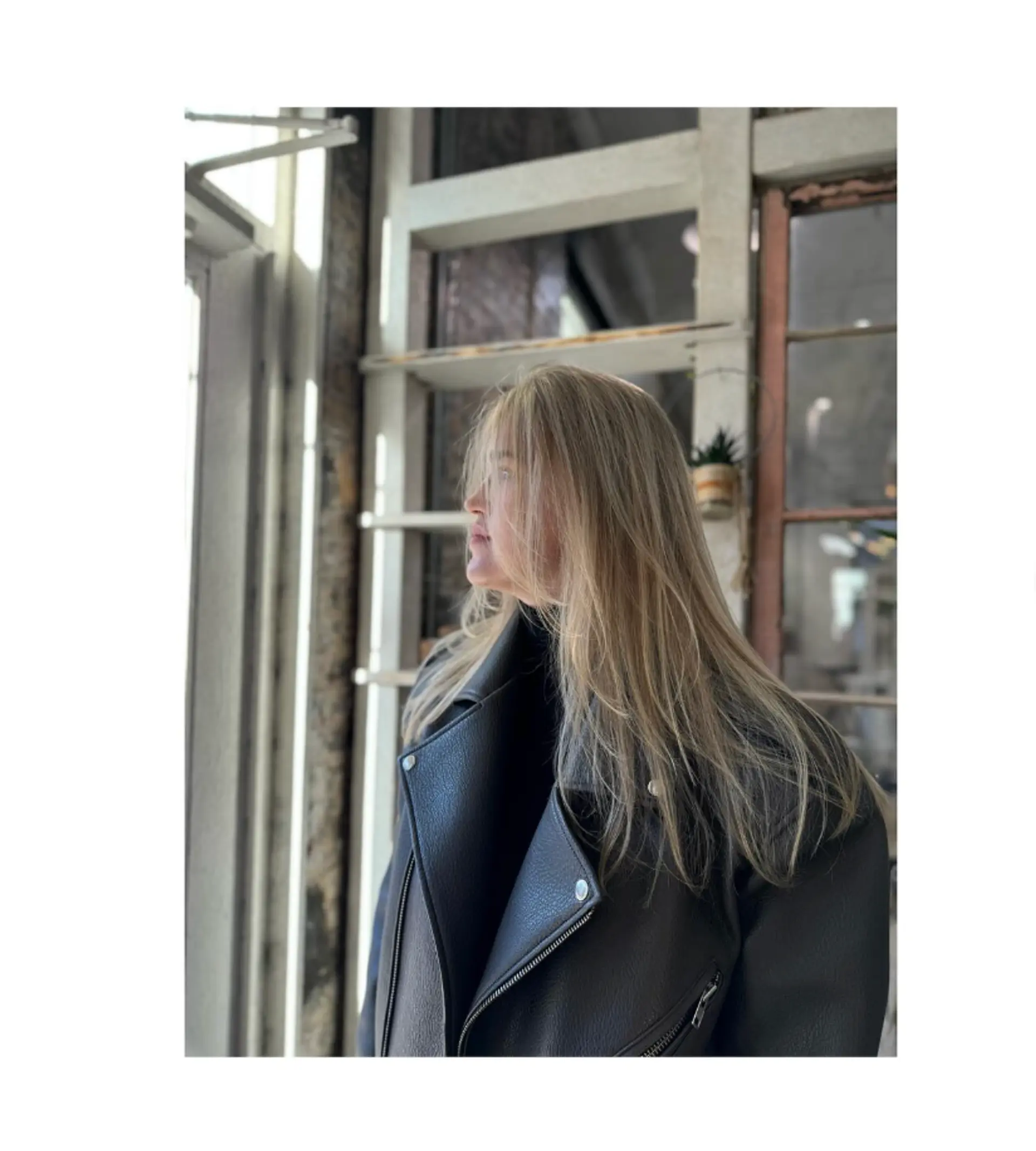 A layered, medium-length hairstyle with a beautiful ash blonde balayage. 1