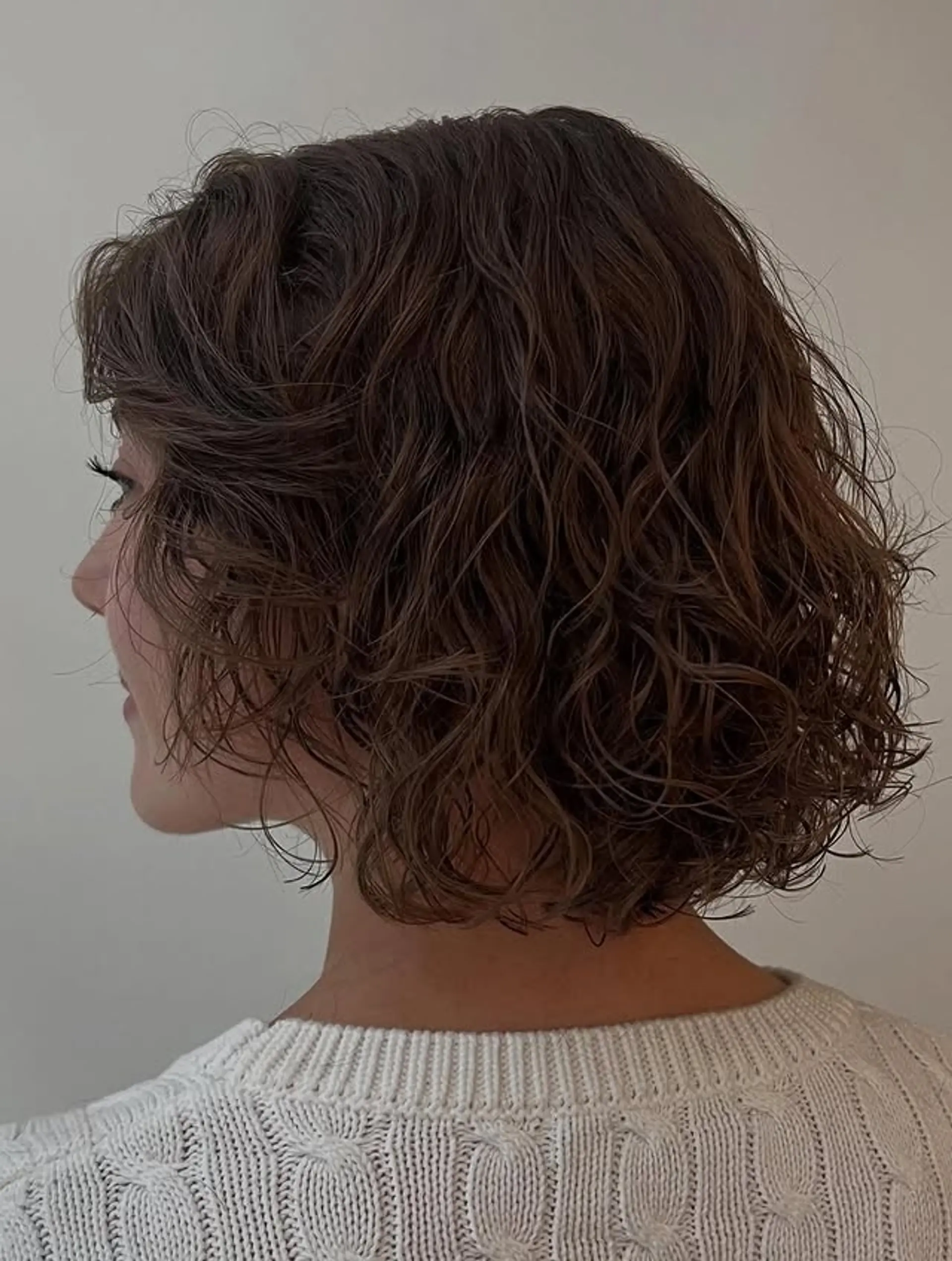 A modern, shaggy wavy bob with lots of texture and layers. 1