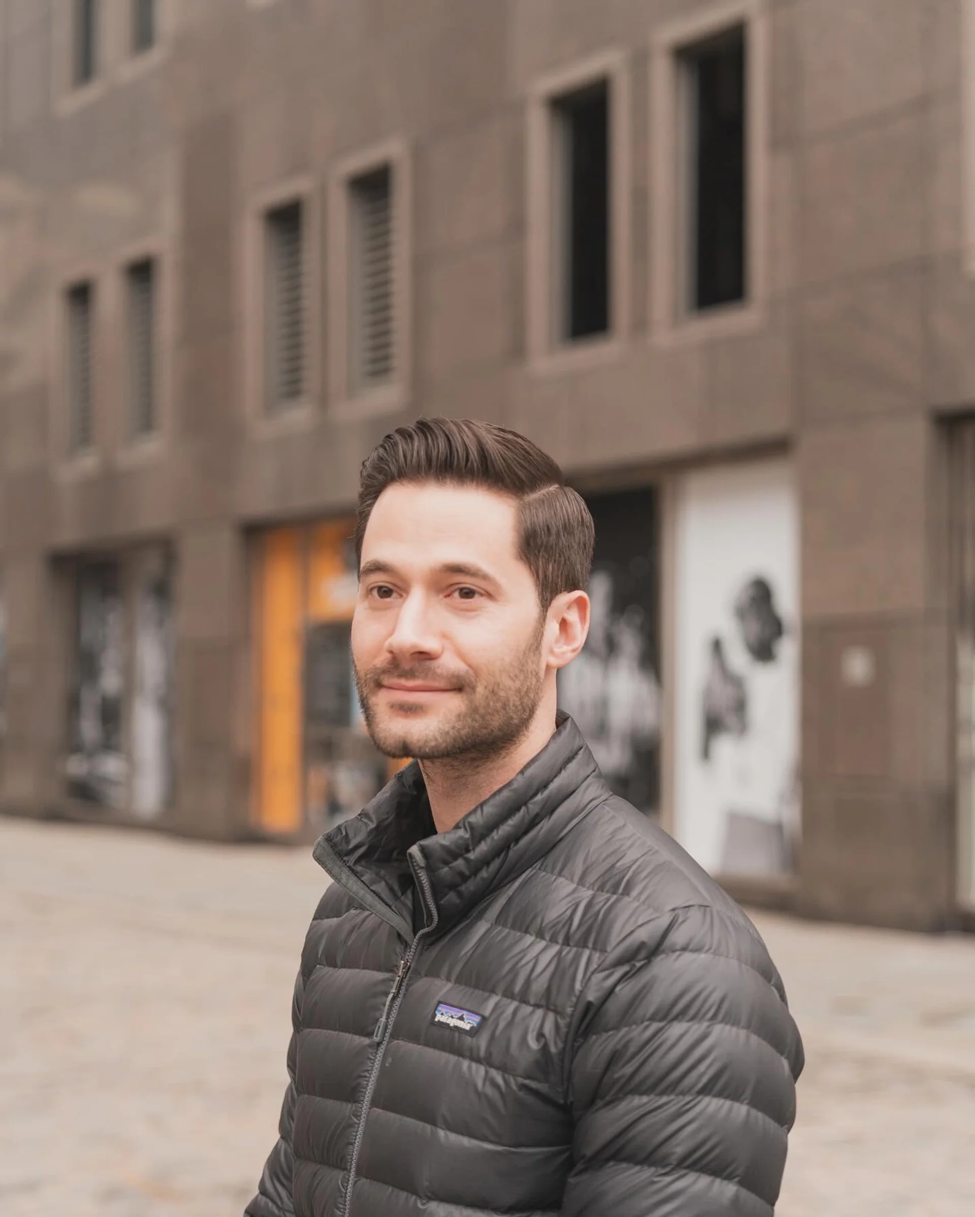 Sleek men's side-swept haircut with subtle side part and soft taper, styled with volume at the crown, perfect for the modern NYC gentleman. - Preview 1