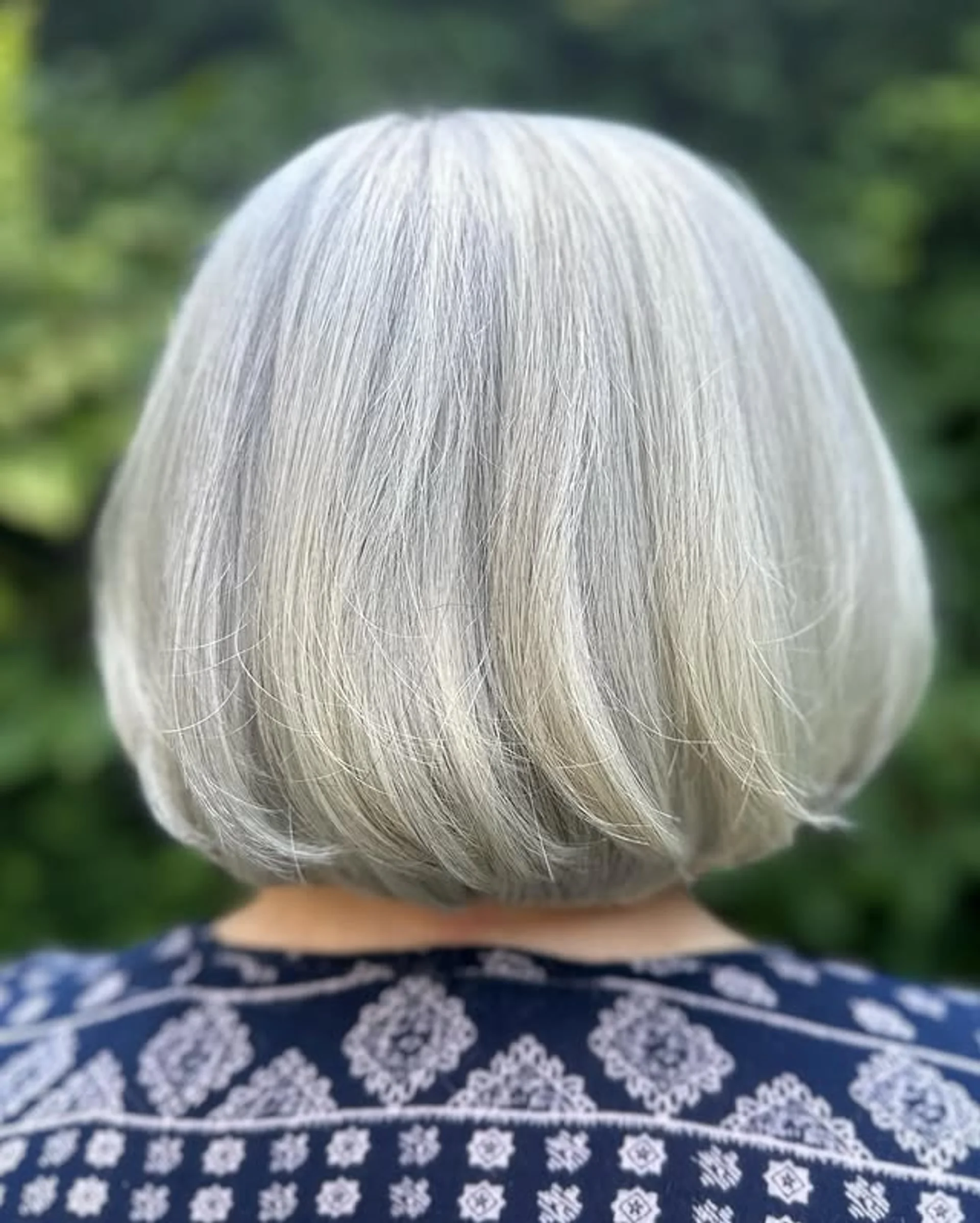 Sleek cream blonde medium straight hairstyle, setting a modern tone for 2025 trends - Preview 1