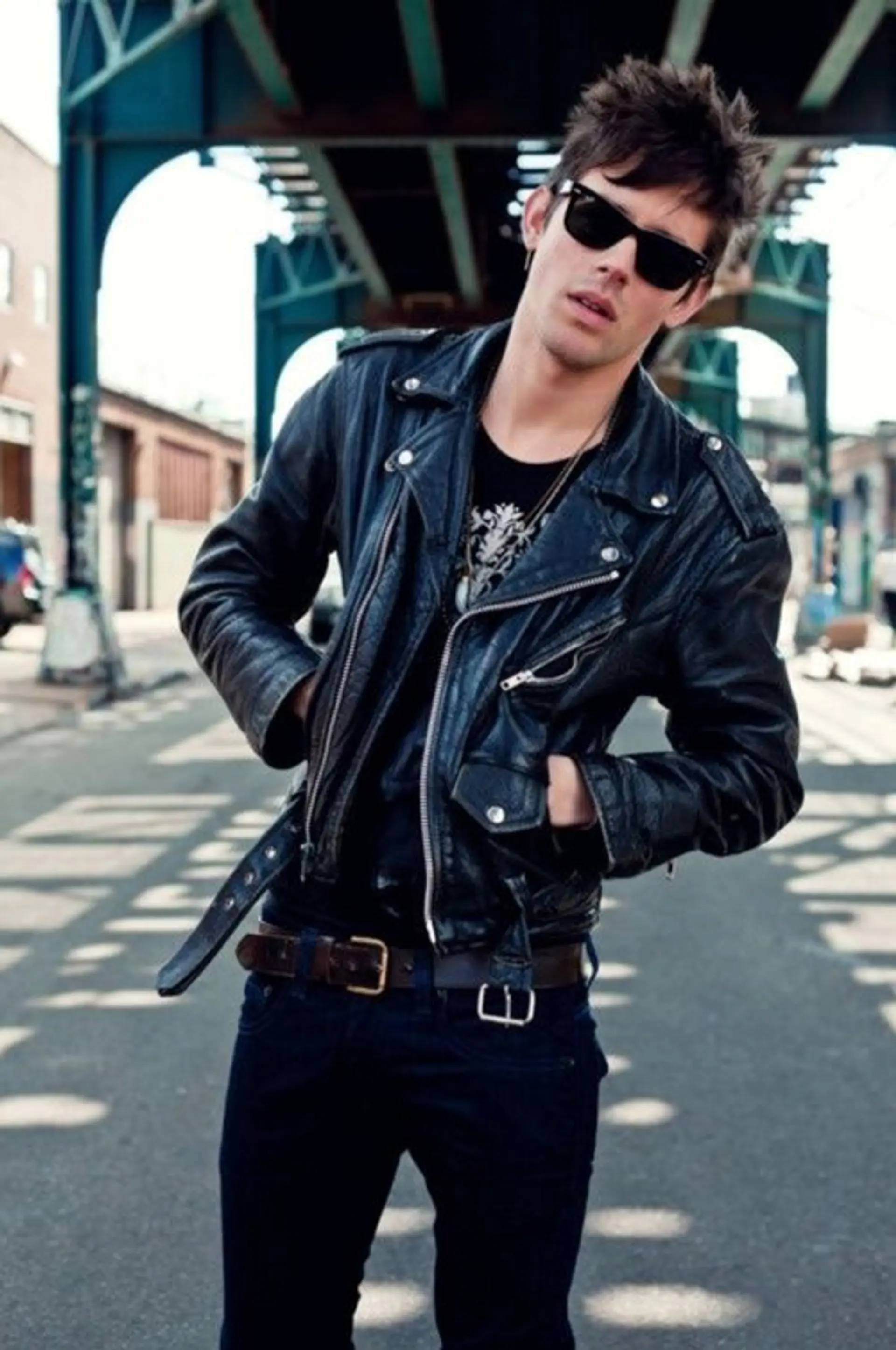 A short, textured haircut with spiky styling for a modern, edgy look. 1