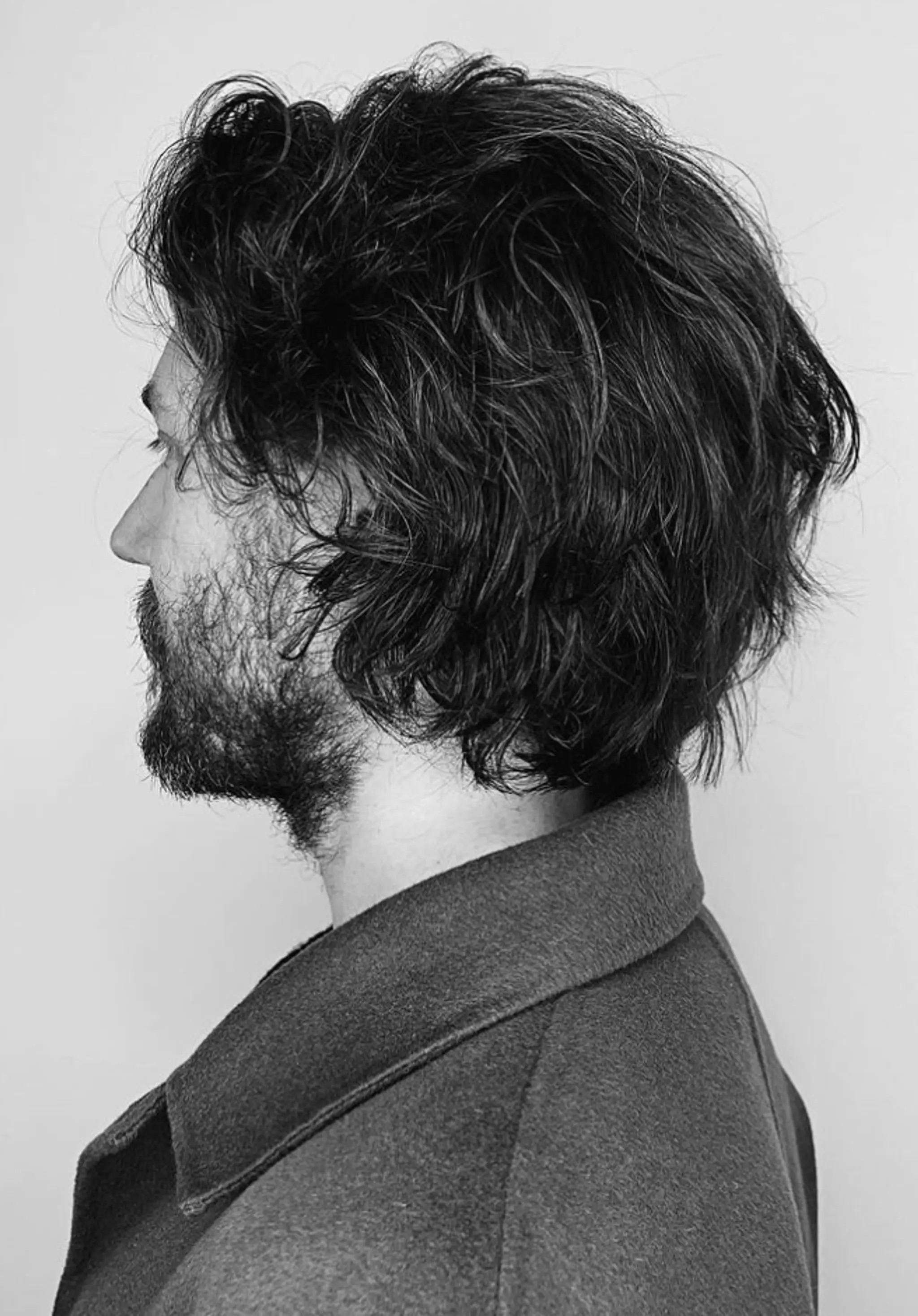 Medium-length dark brown wavy hair with a natural, textured look that includes subtle layers and a slightly windswept, casual style.

Cut and style by @juliamannino_hair