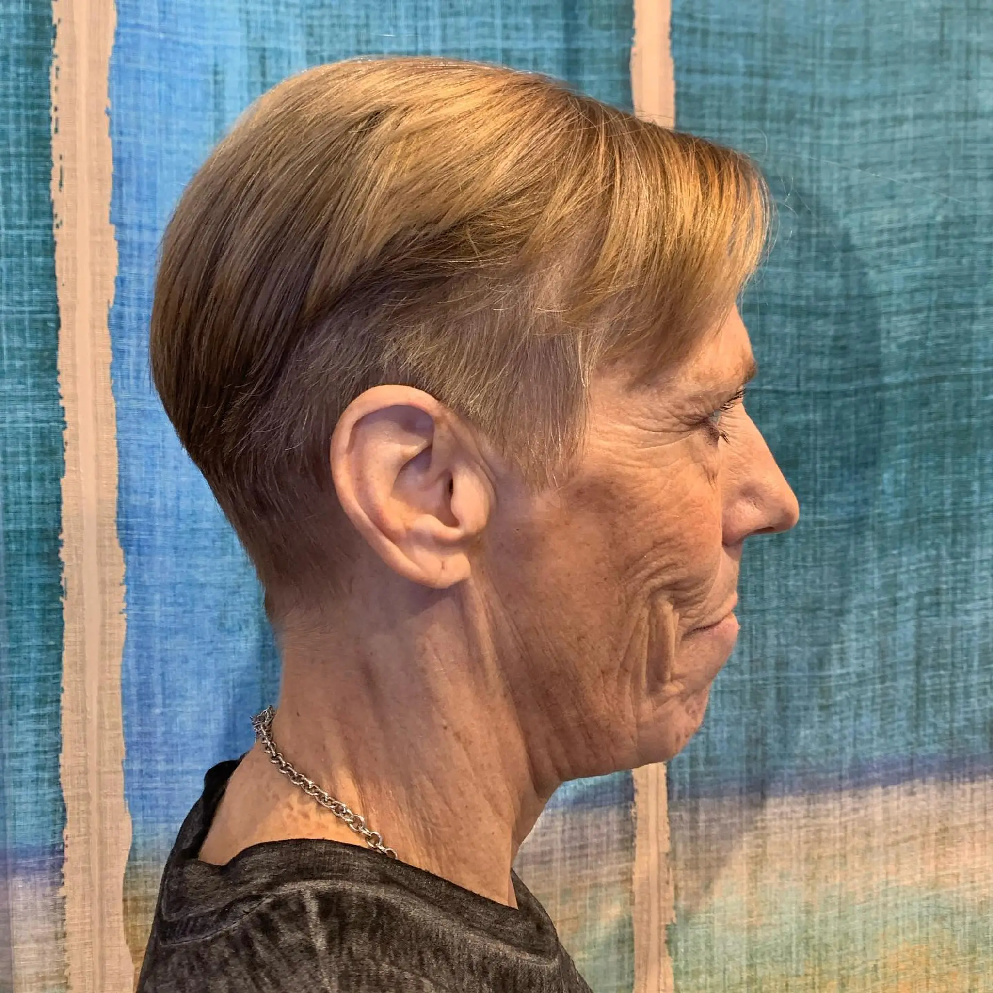 A short, tapered pixie cut.