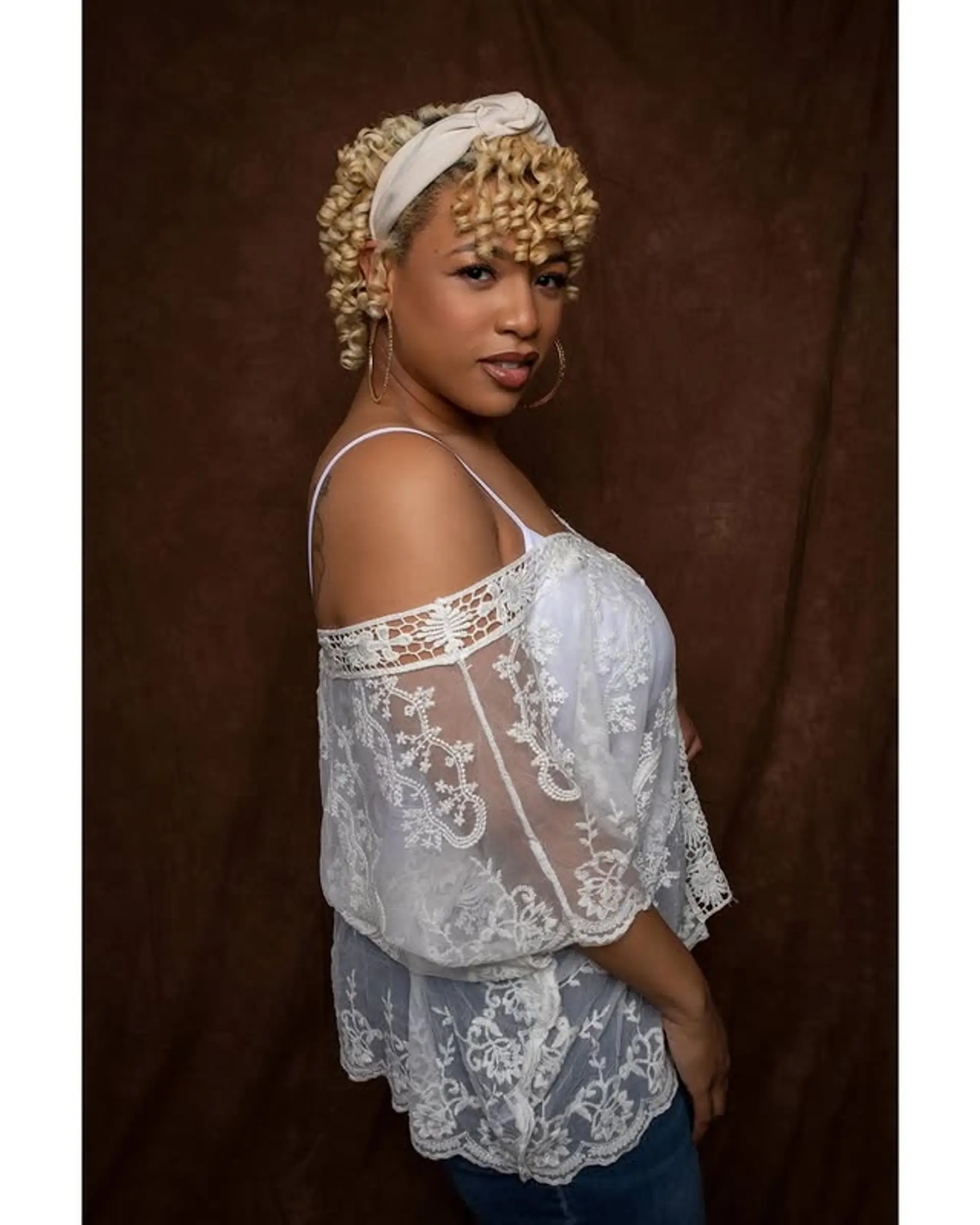 A short curly bob with defined curls. 1