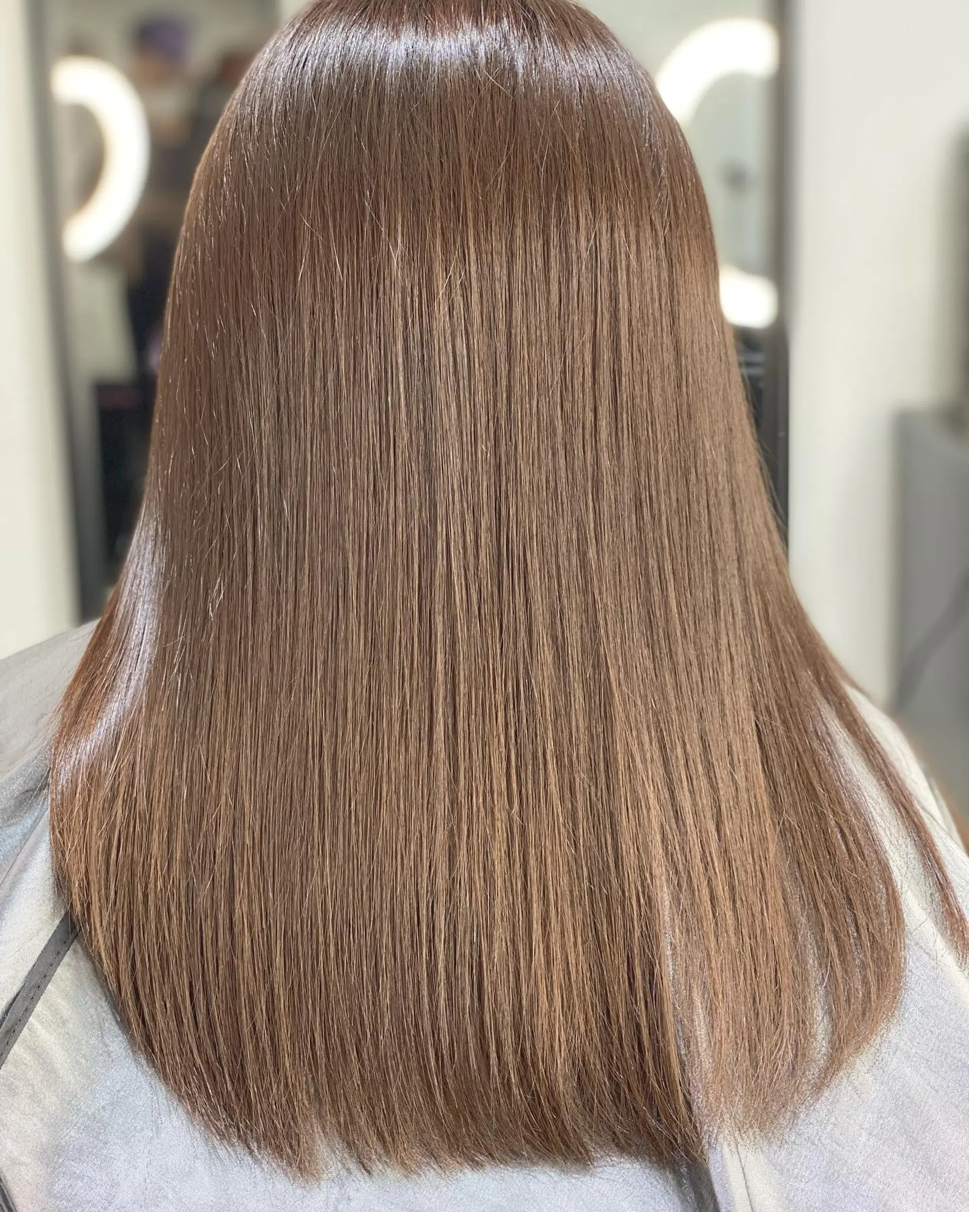 Long, straight, and sleek mocha brown hair. 1