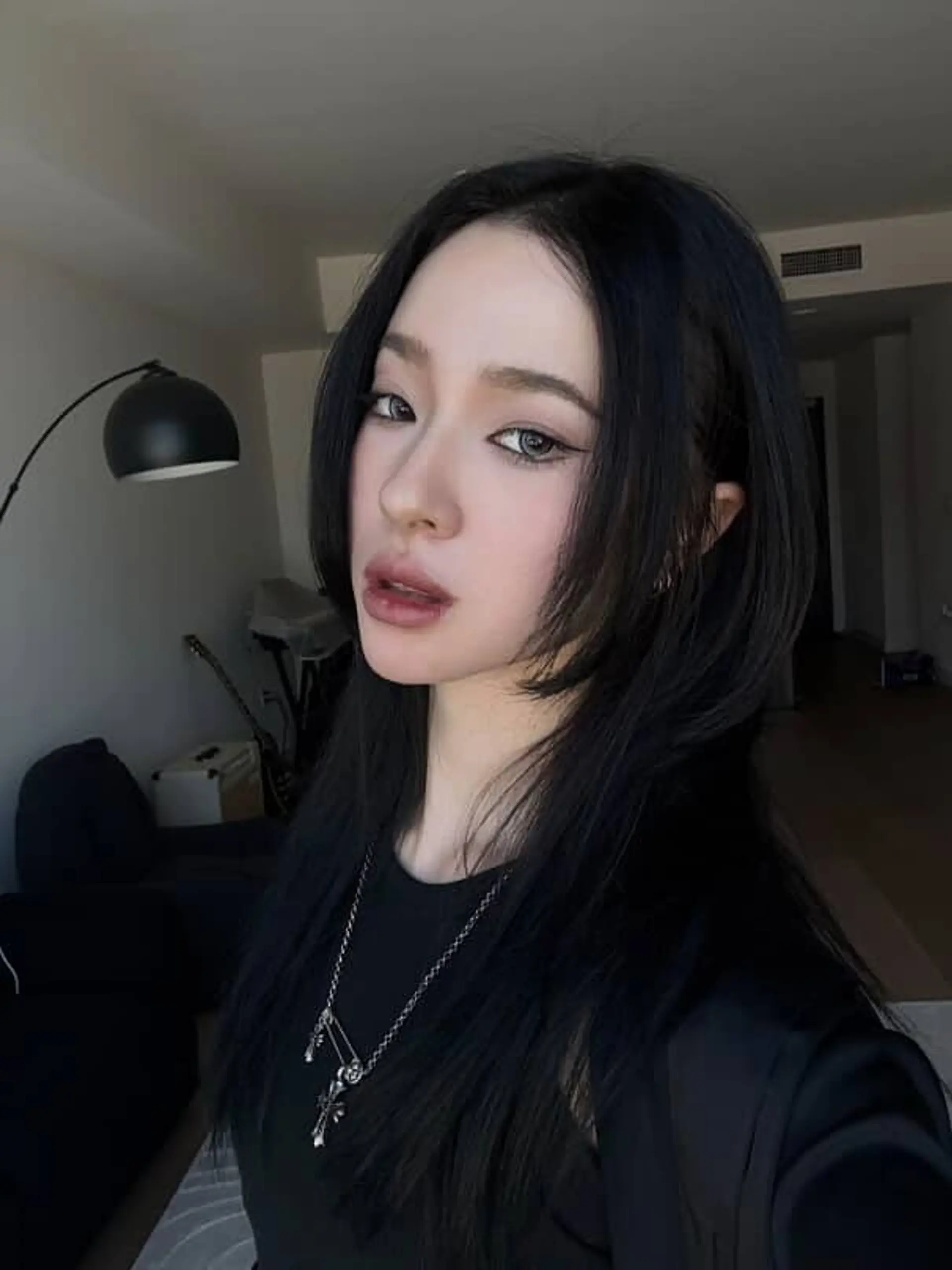 Choppy layered wolf cut with curtain bangs. 1