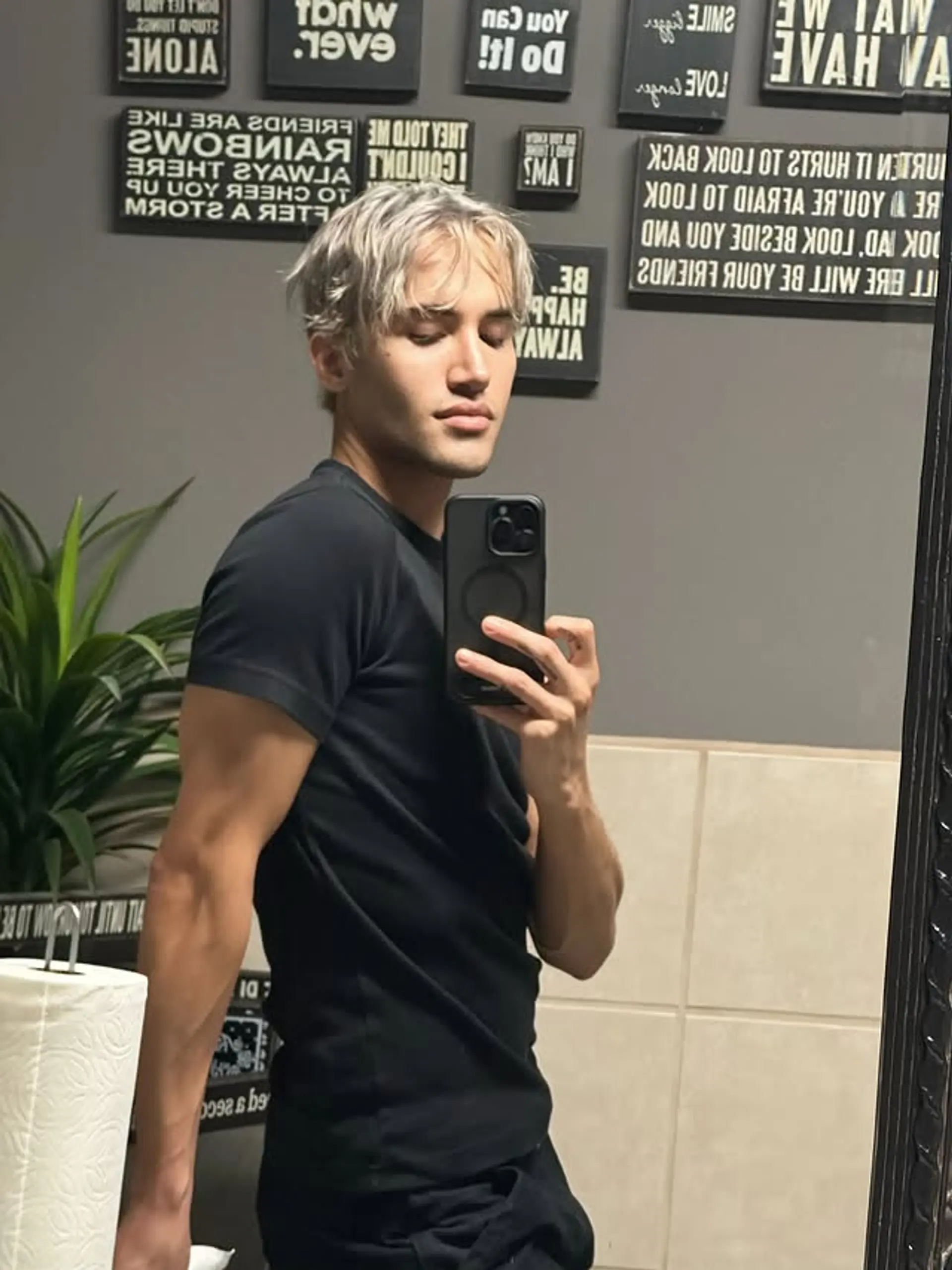 A short, textured crop with a bleached blonde color. 1