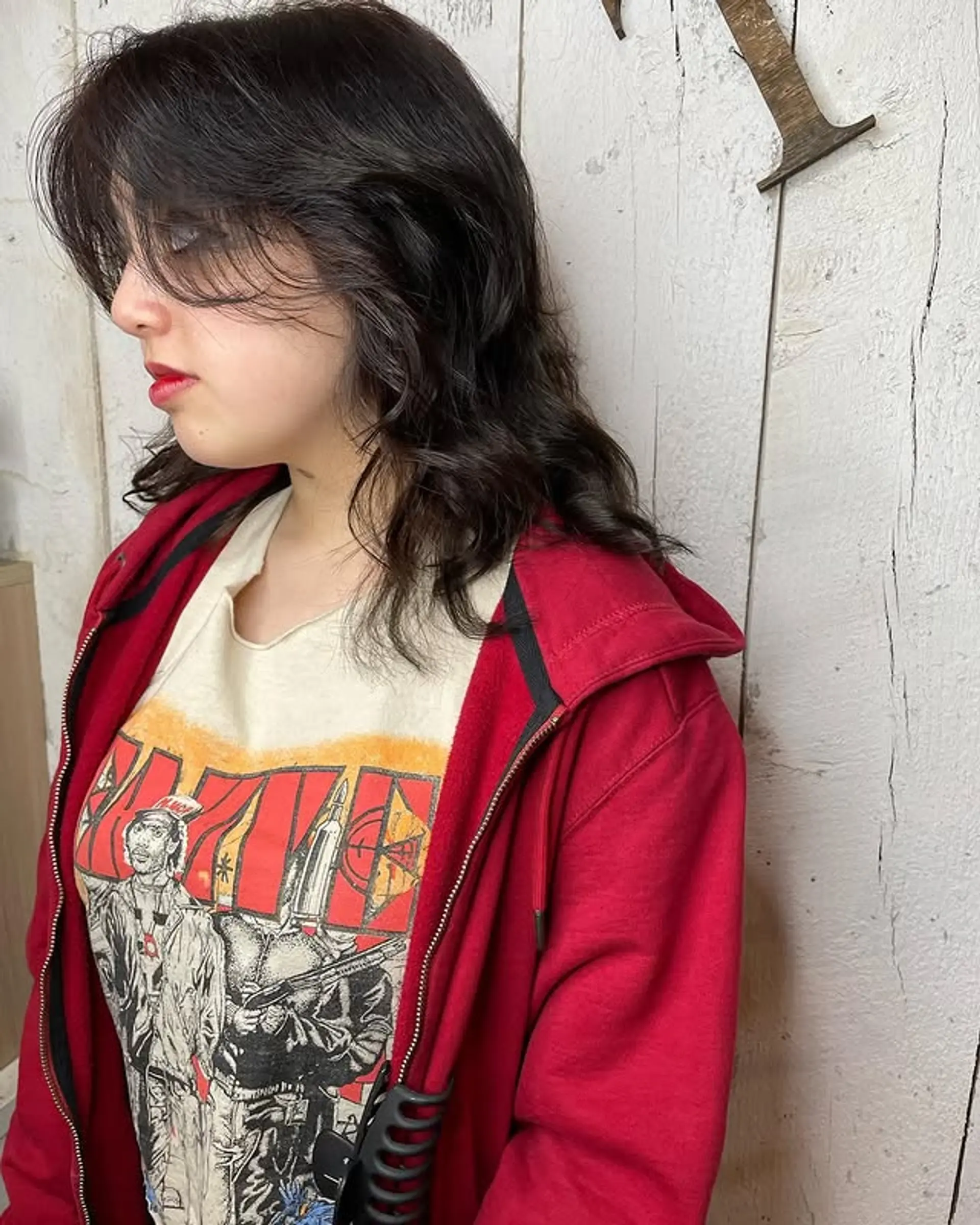 A layered shag with face-framing curtain bangs. 1