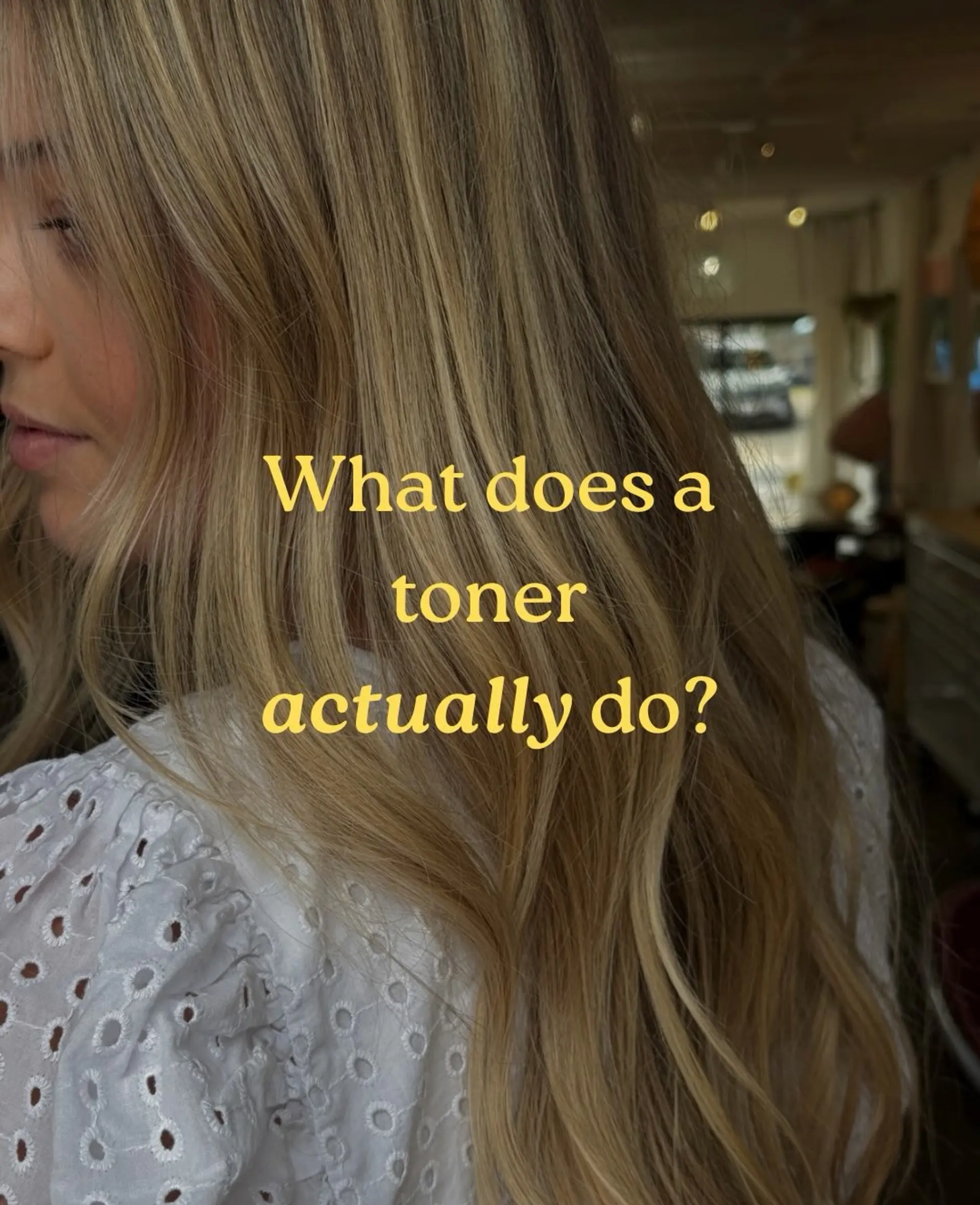 Long dimensional blonde hair styled in soft, natural waves. 1