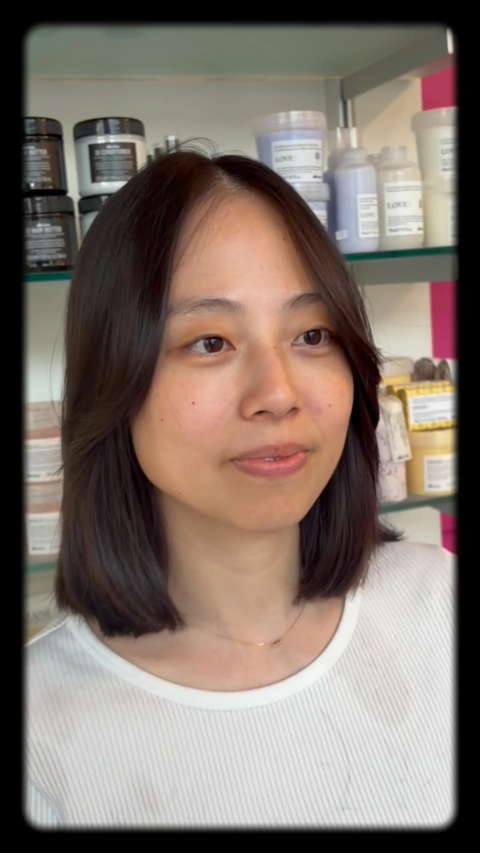 A sleek shoulder-length lob featuring soft face-framing layers and gently rounded ends. 1