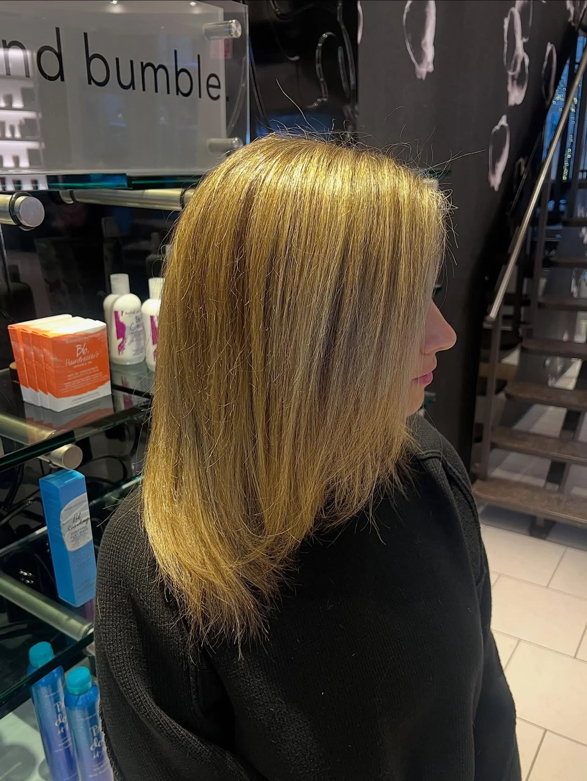 Straight medium-length hair enhanced with warm, multi-dimensional golden blonde highlights. 1