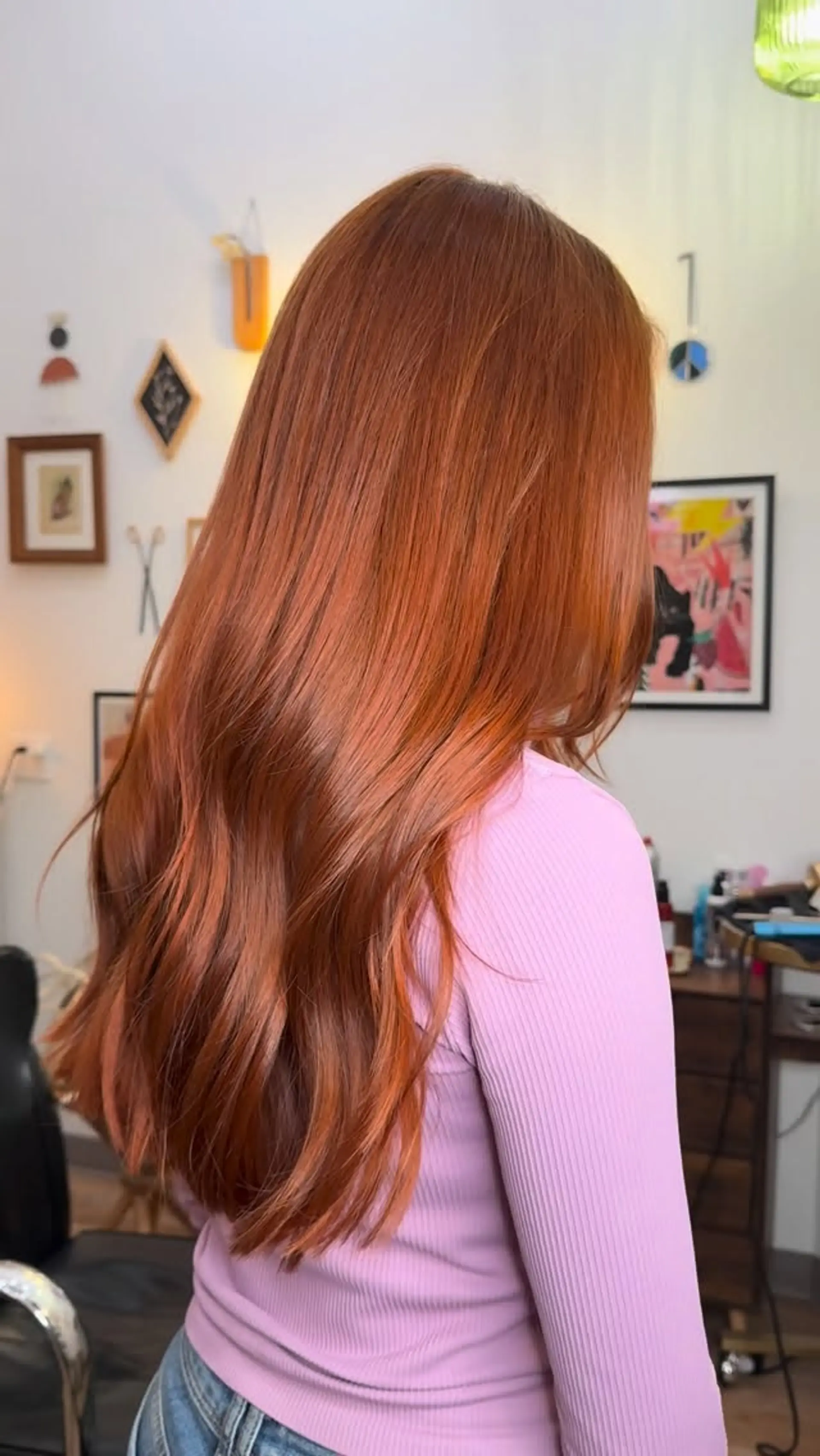 Long, glossy copper red hair styled with soft, subtle waves. 1