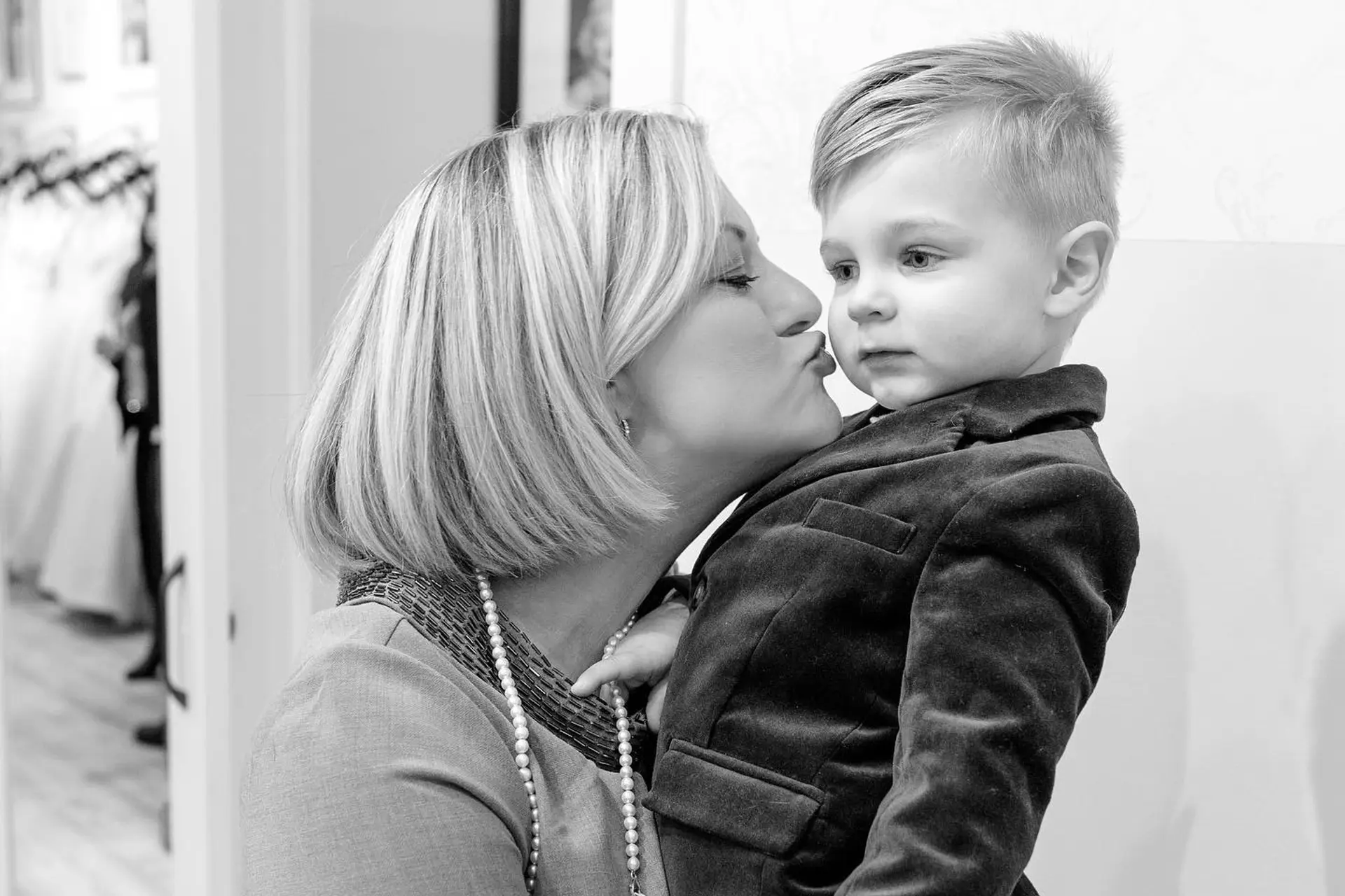 A sleek, chin-length blunt bob paired with a clean, side-swept toddler haircut. 1