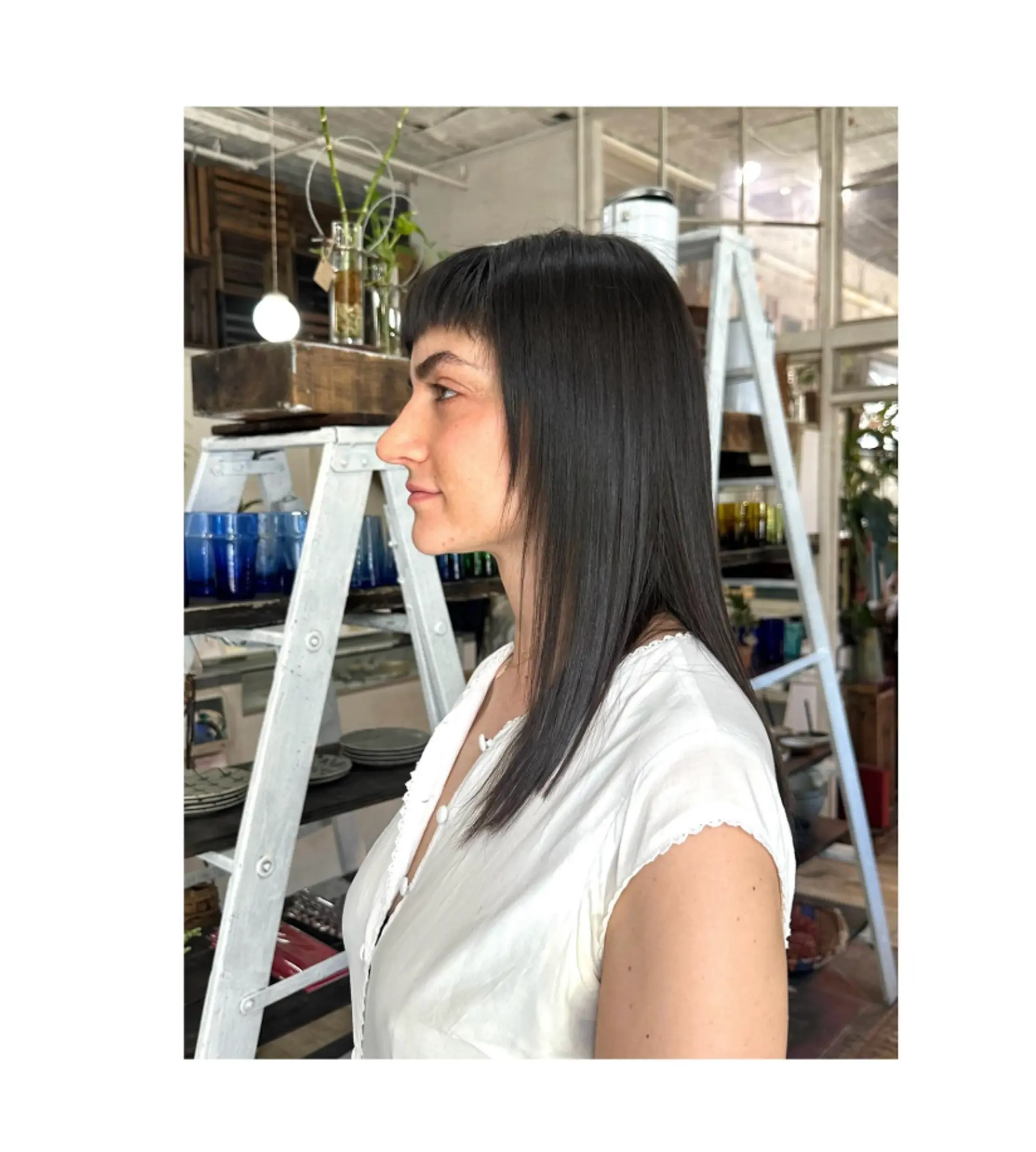 A medium-length shag with micro bangs and choppy layers. 1