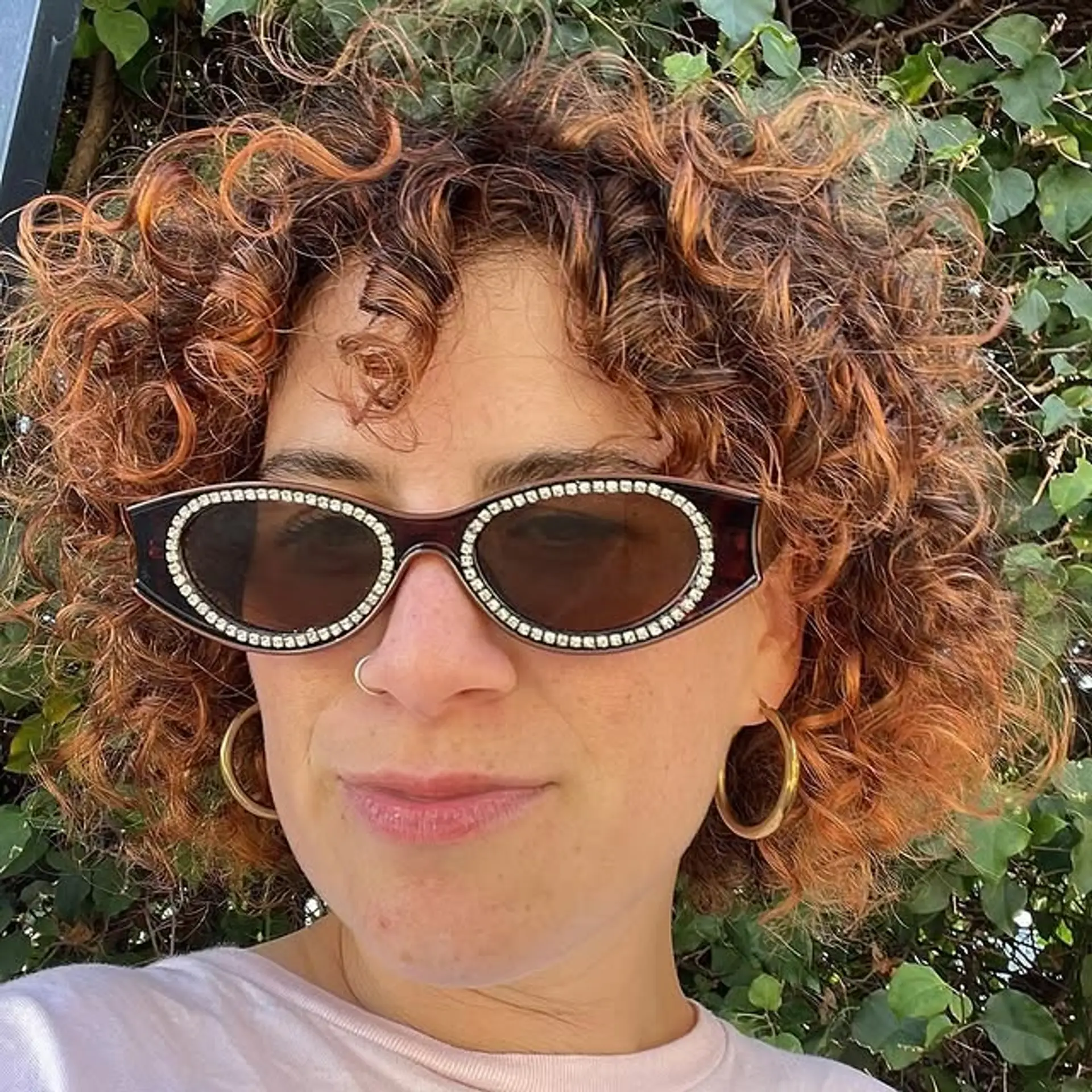 A stylish short curly bob. 1