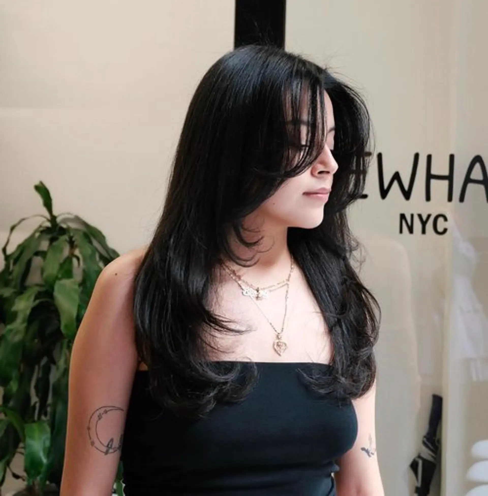 Long hair with curtain bangs and face-framing layers. 1