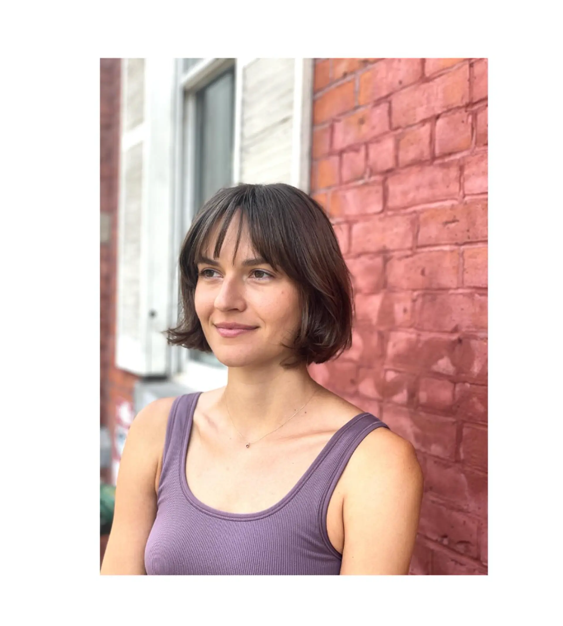 A classic chin-length French bob with straight hair and blunt bangs. 1