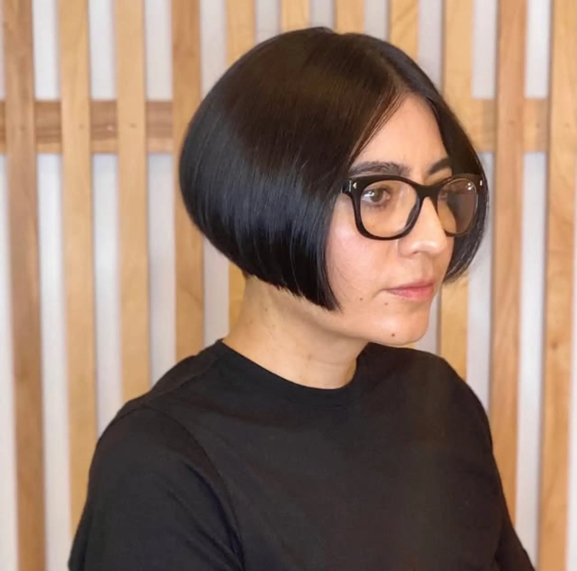 A sleek and stylish chin-length bob with a blunt cut. 1