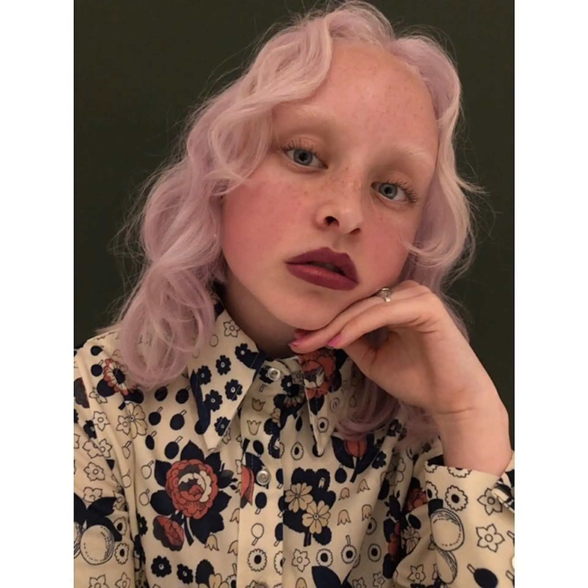 Medium-length wavy hairstyle with soft, flowing waves in a pastel pink and lavender blend. 1