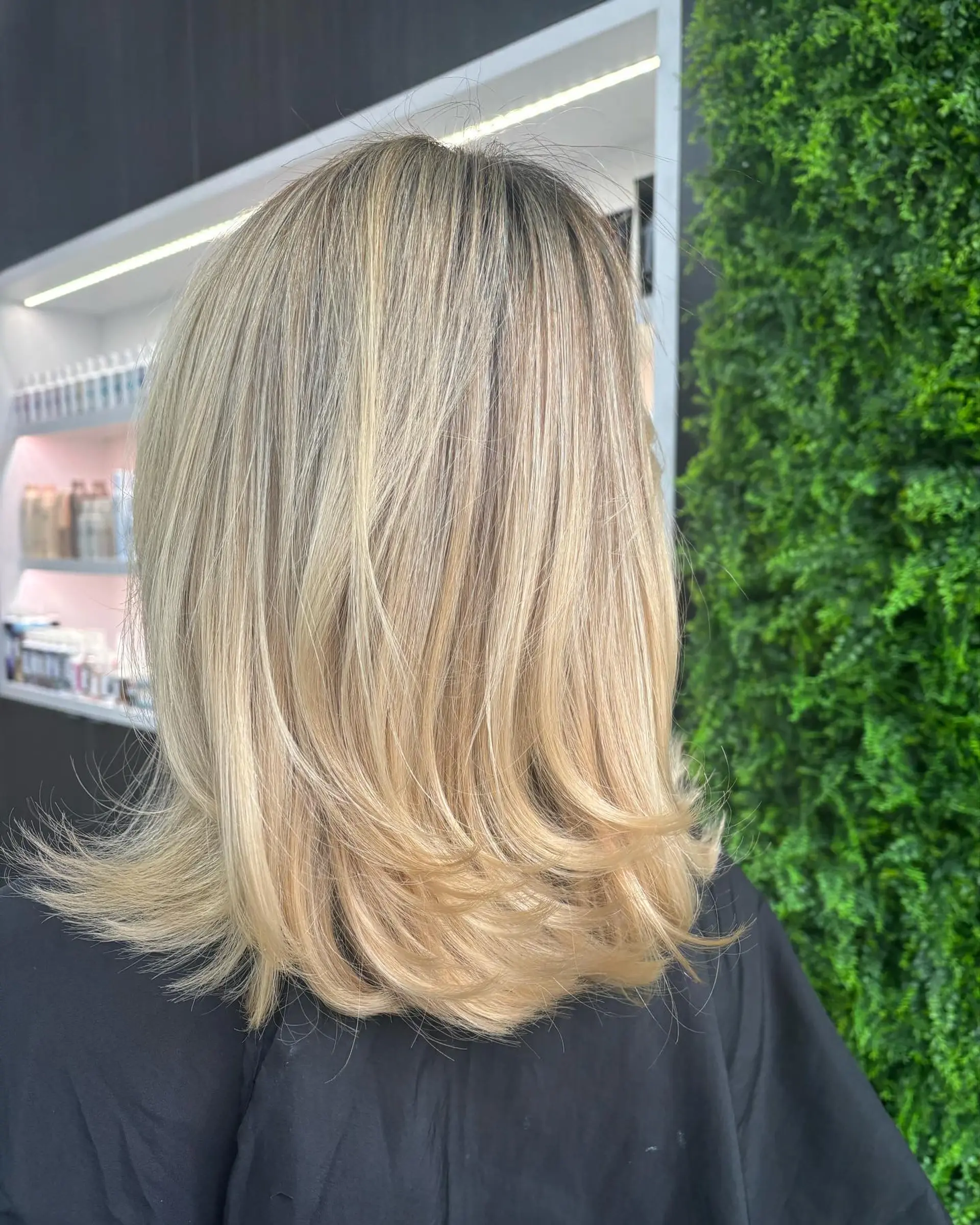 A layered lob with curtain bangs. 2