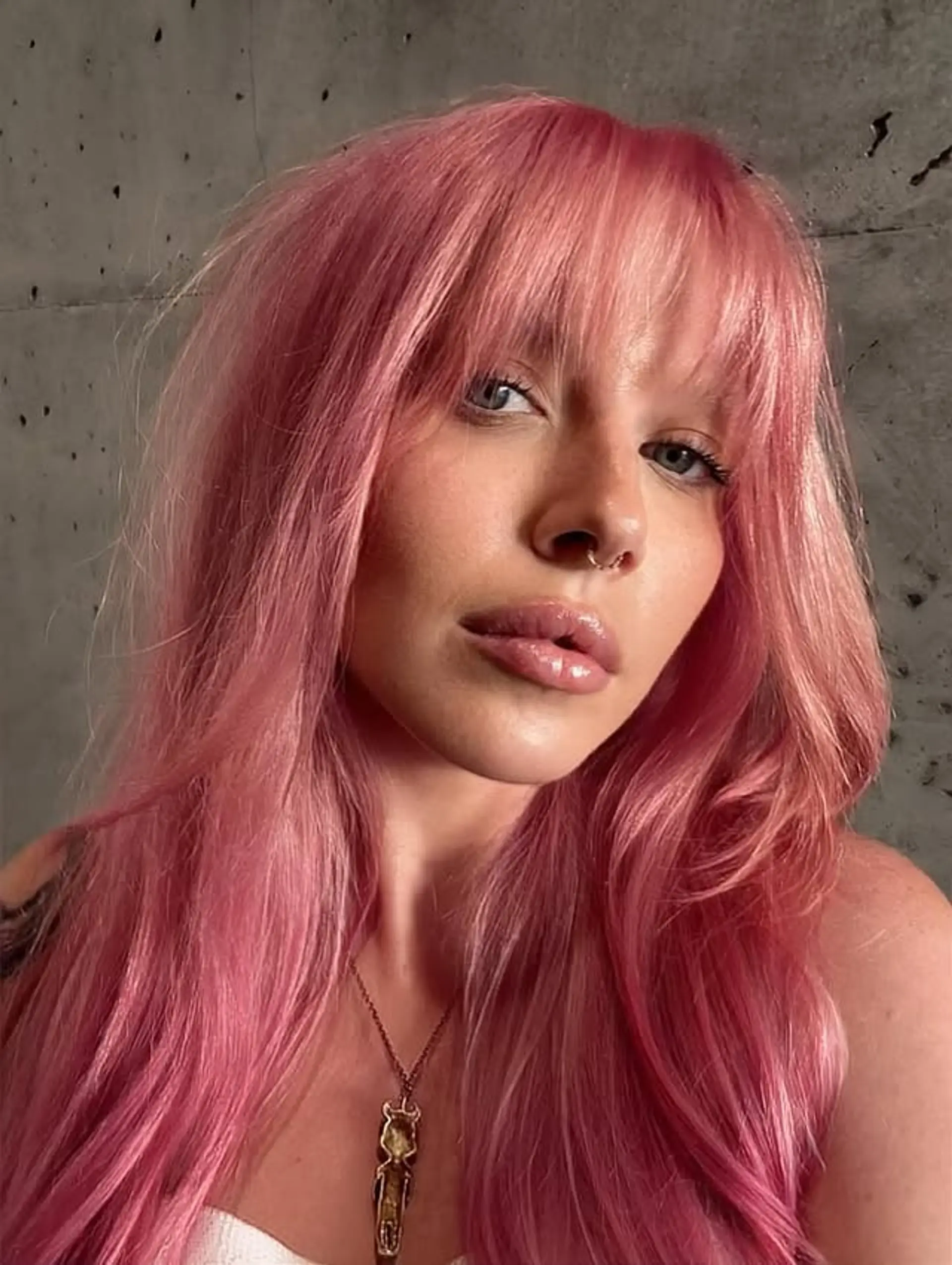 A shag haircut with curtain bangs. 1