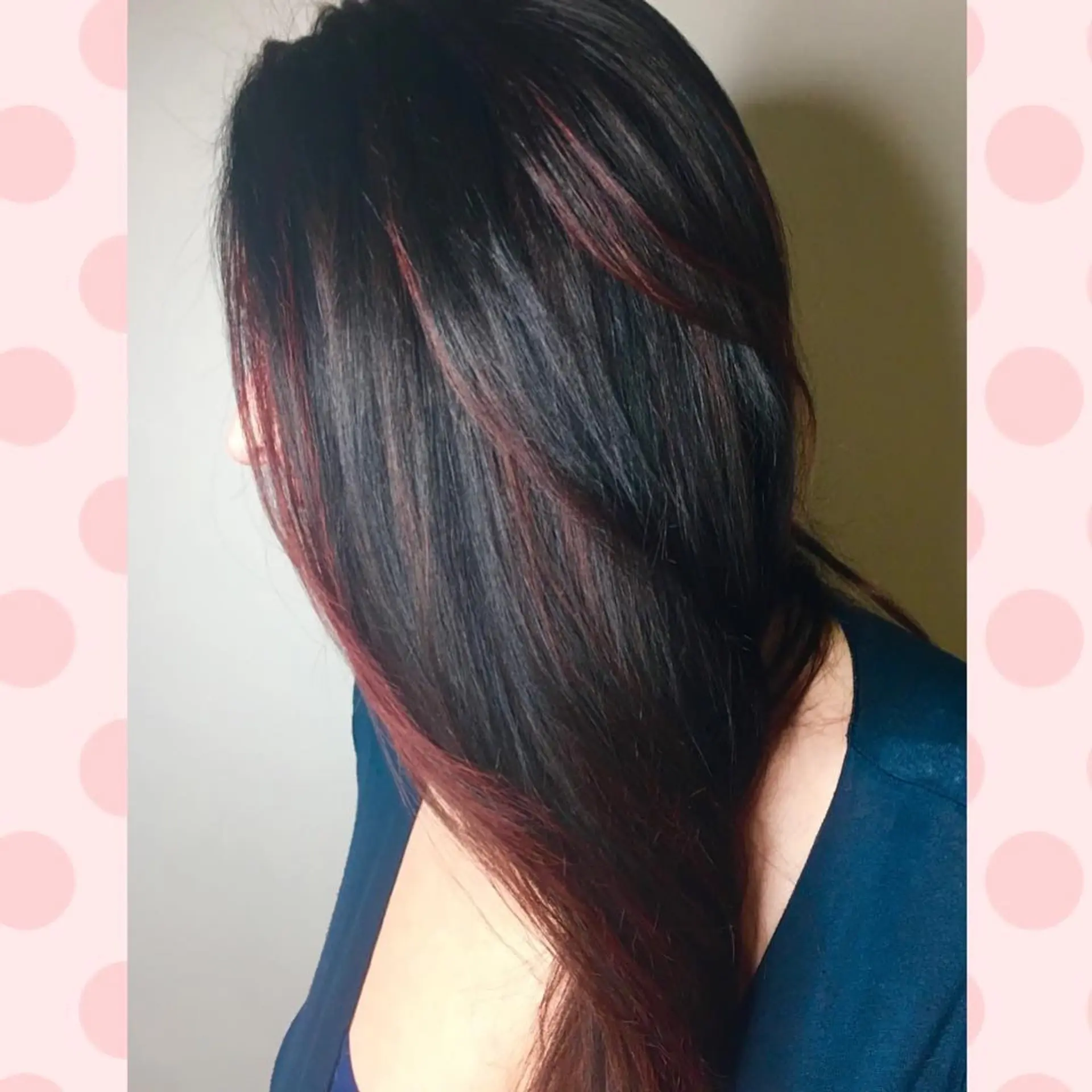 Long, smooth dark hair featuring subtle red and burgundy balayage highlights throughout. 1