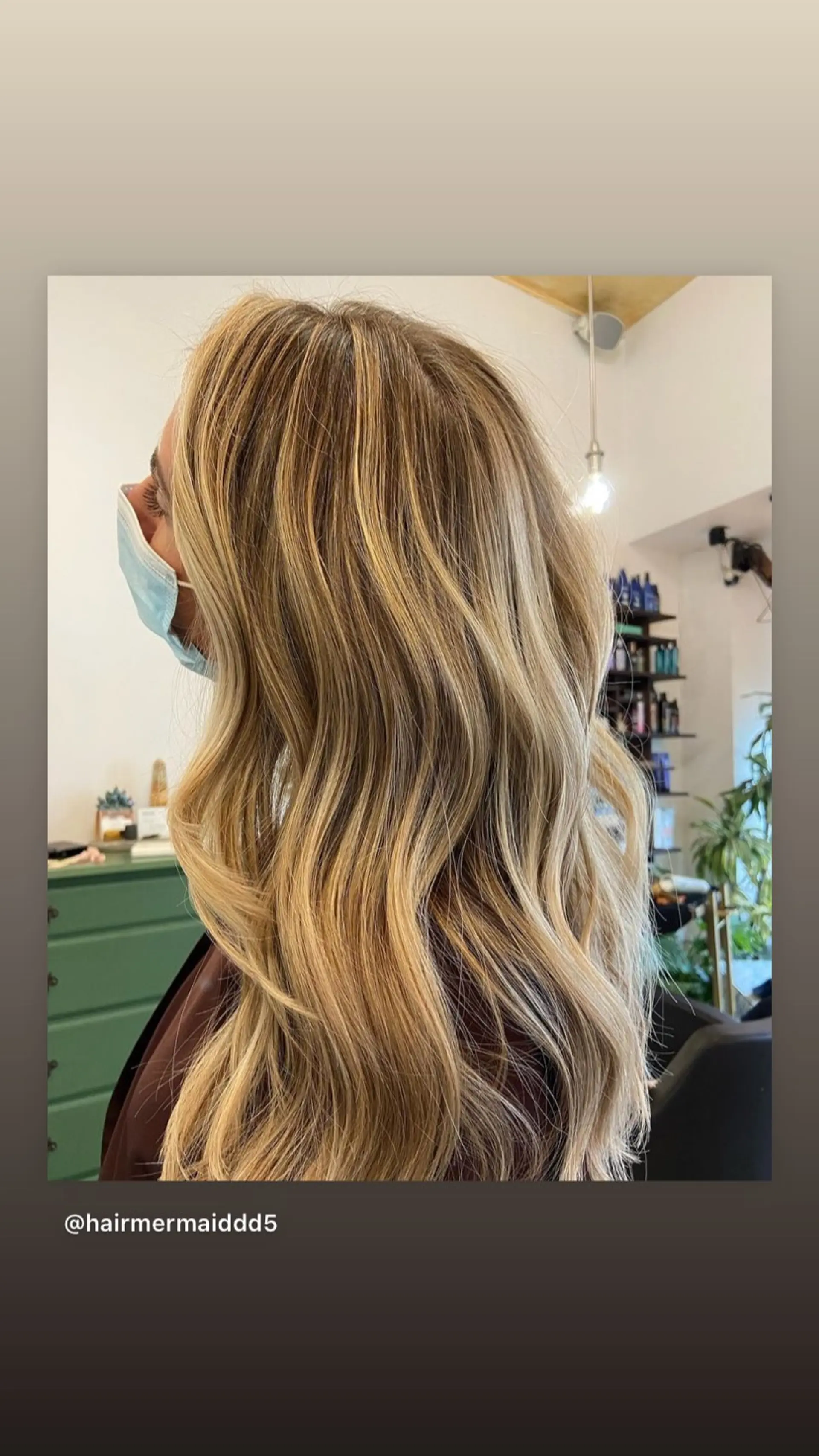 Long, wavy hairstyle with a golden blonde balayage and subtle highlights. 1