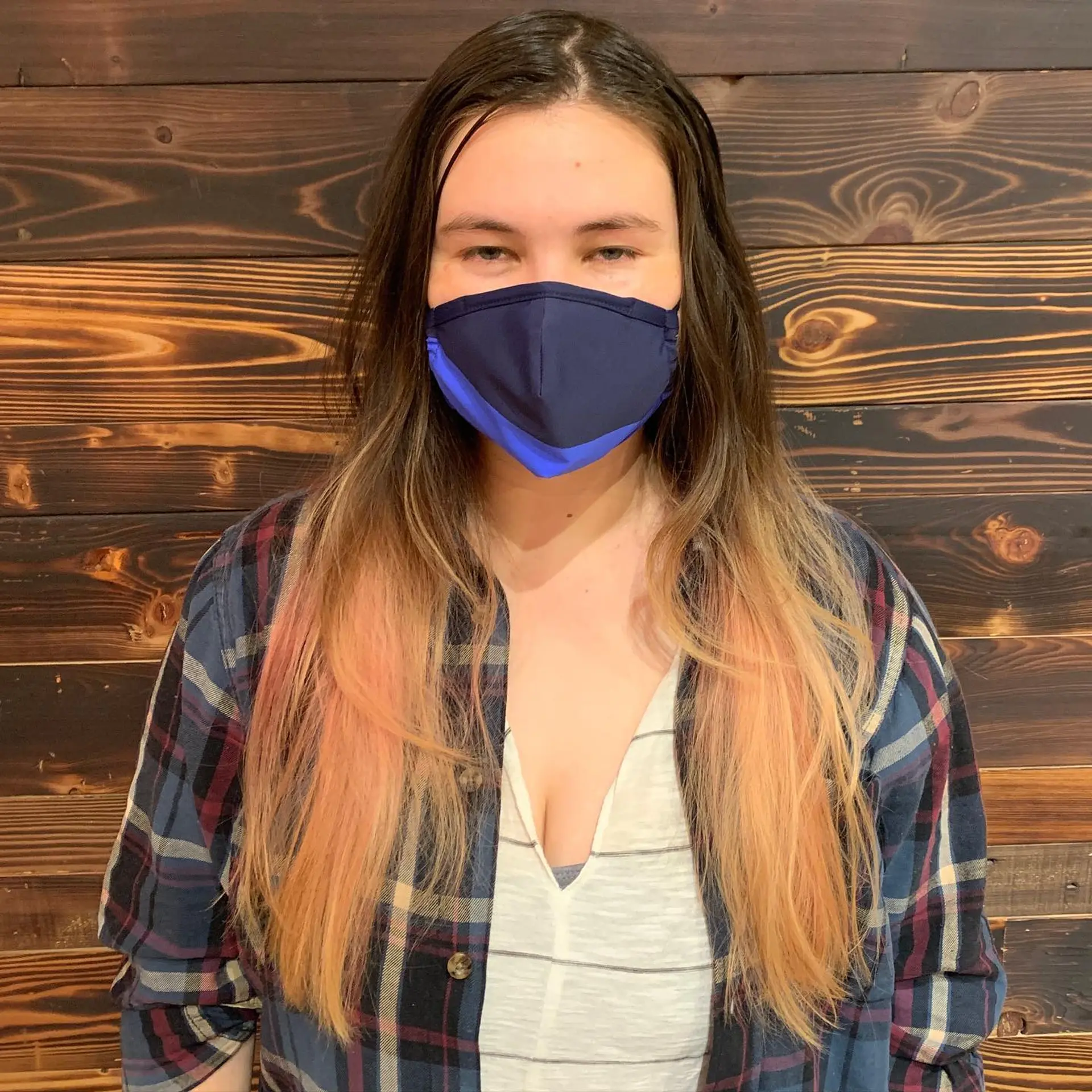 Medium length straight hair with bronde color, copper lowlights, and face-framing layers. 2