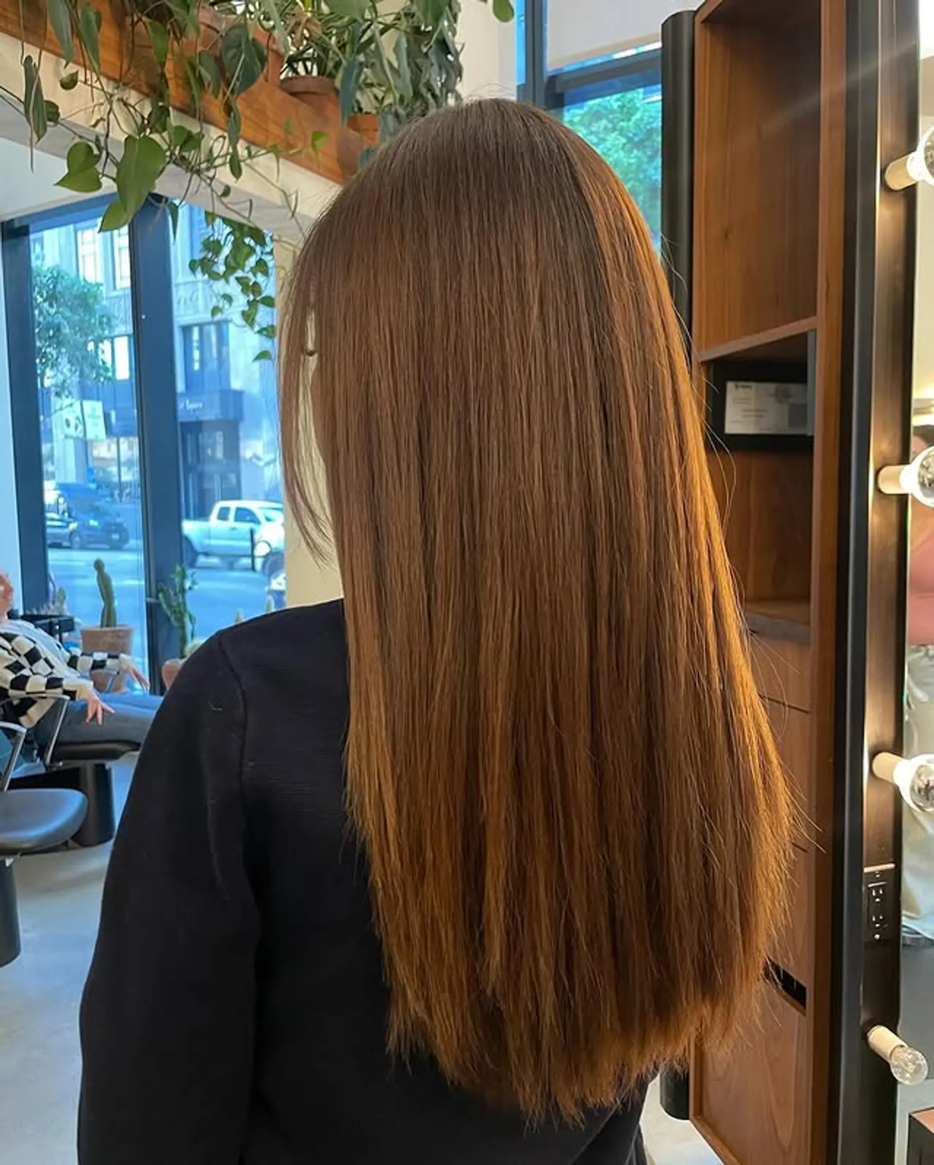 This is a long, layered hairstyle with face-framing layers. 1