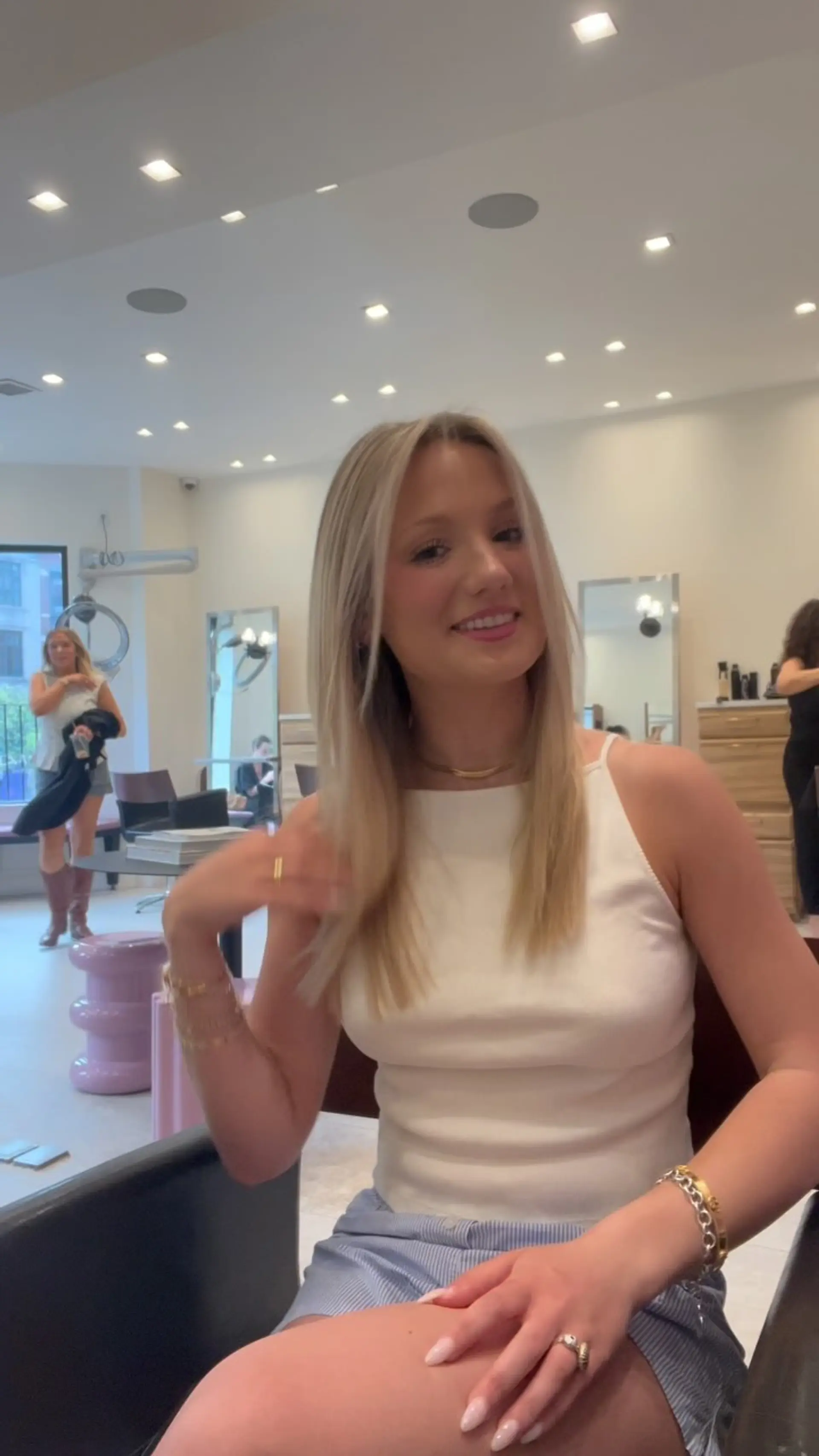 Long, silky straight blonde hair with face-framing layers and a clean center part. 1